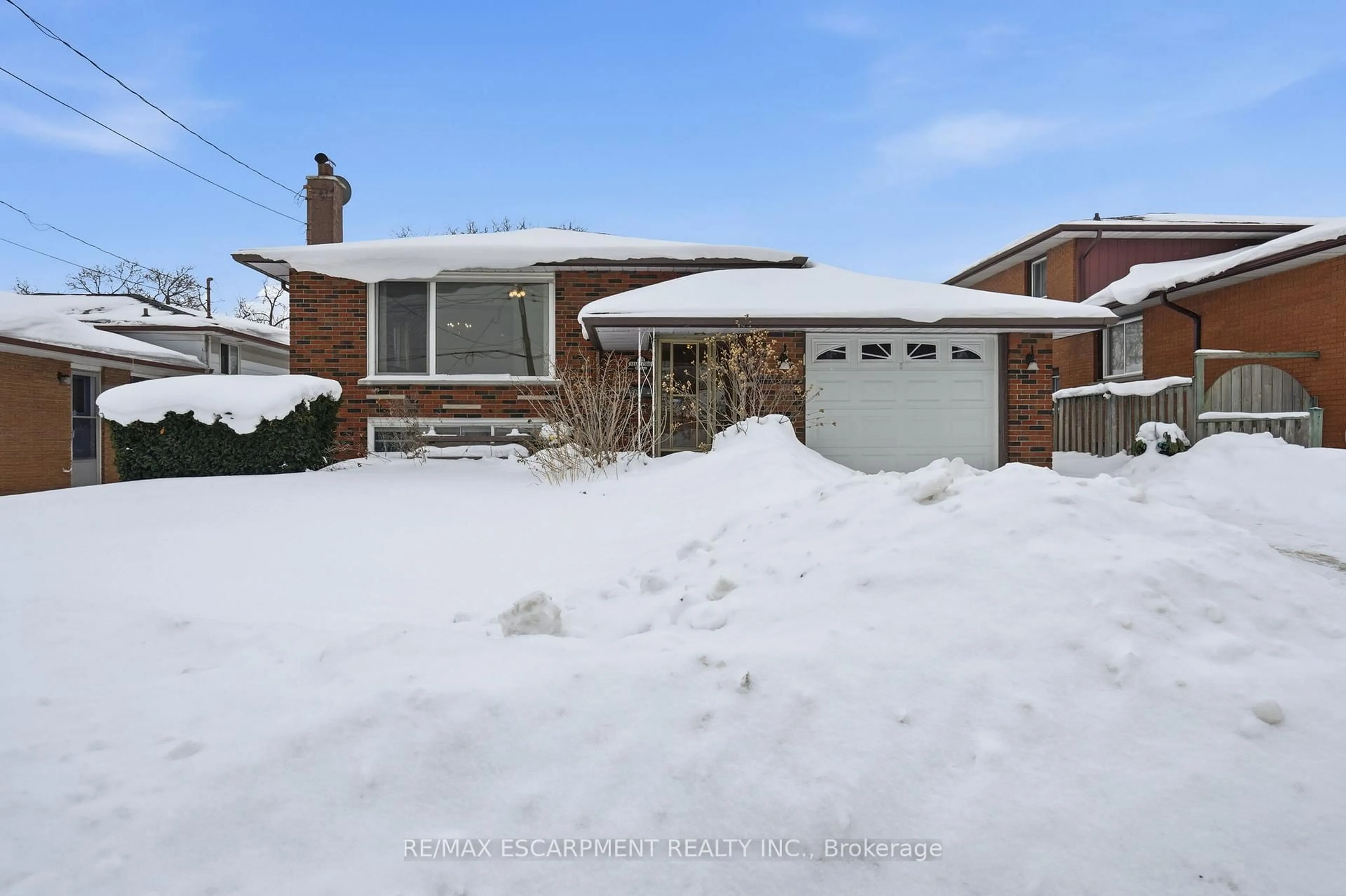 Home with brick exterior material, street for 63 Marlowe Dr, Hamilton Ontario L9C 2H8