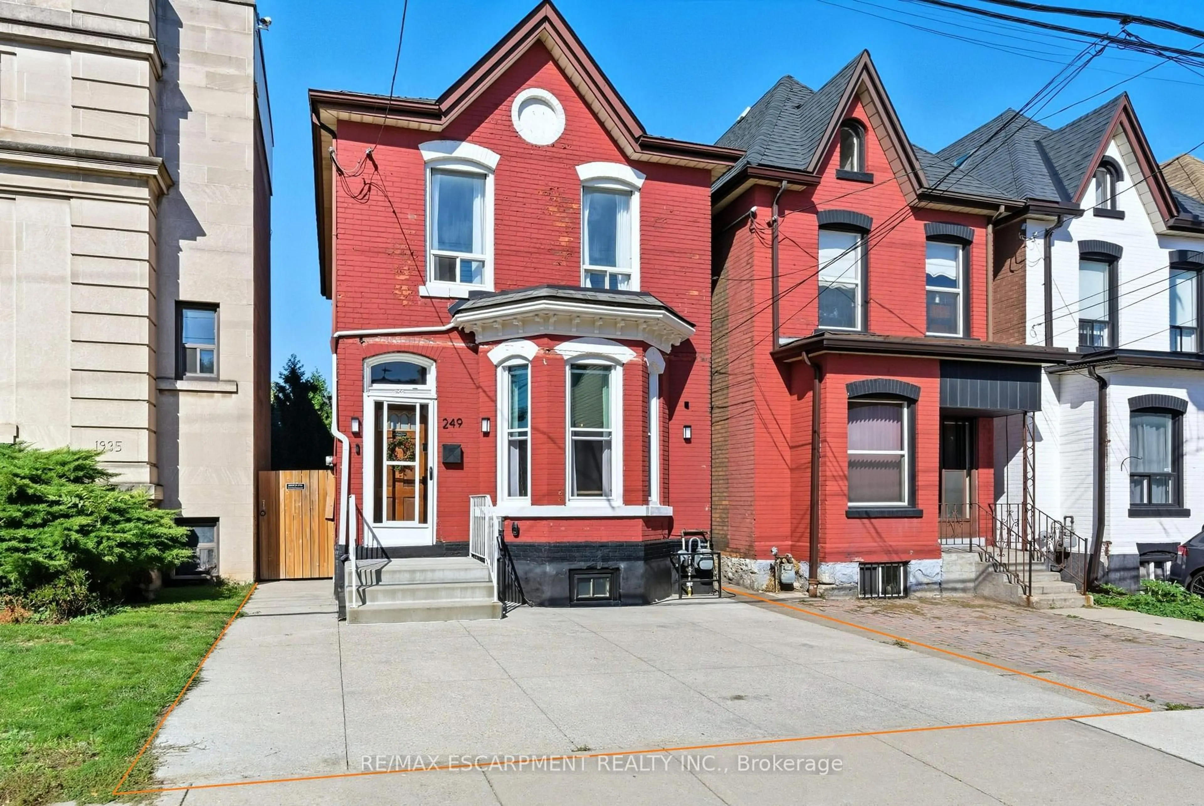 Home with brick exterior material, street for 249 Bay St, Hamilton Ontario L8L 1M2
