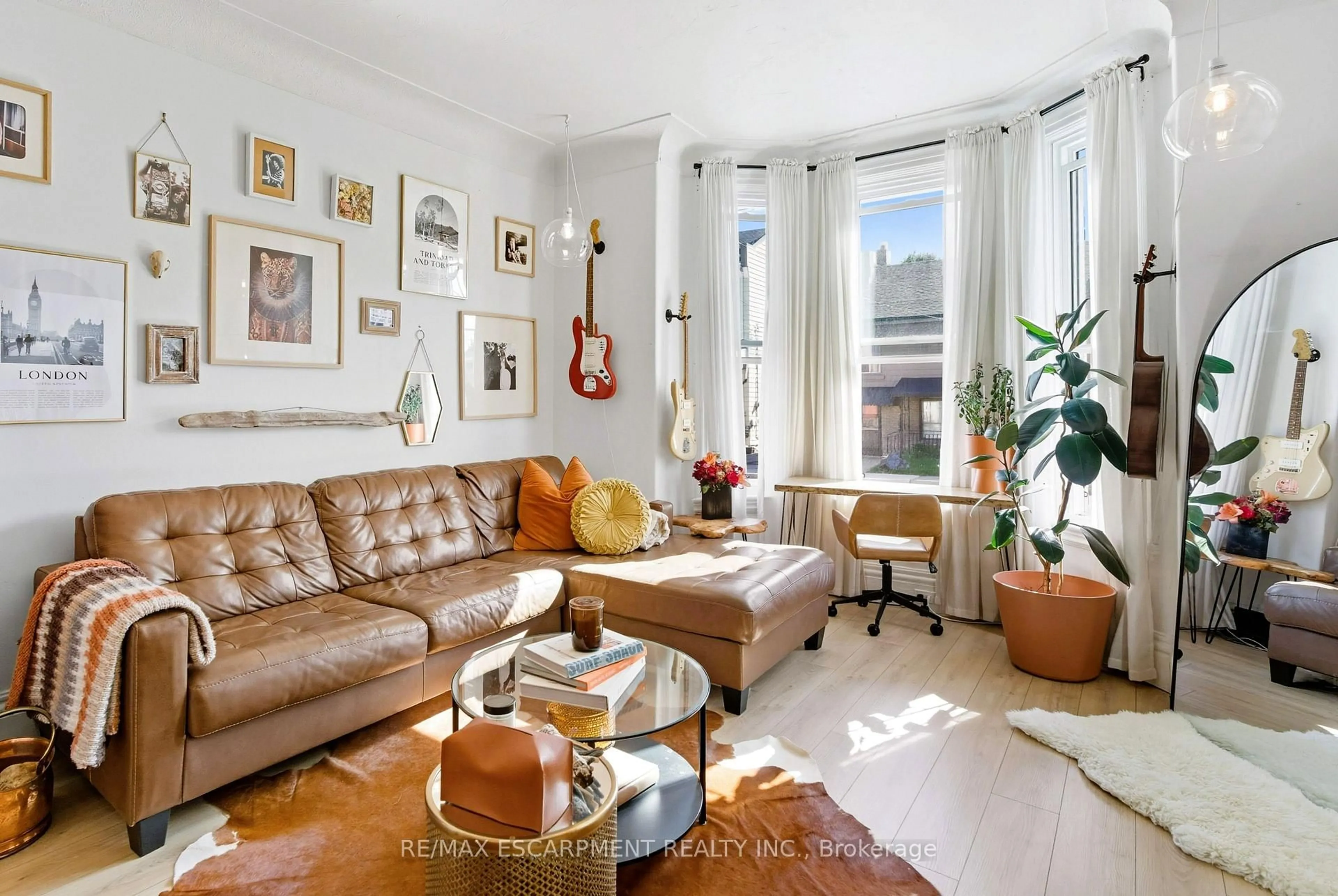 Living room with furniture, unknown for 249 Bay St, Hamilton Ontario L8L 1M2