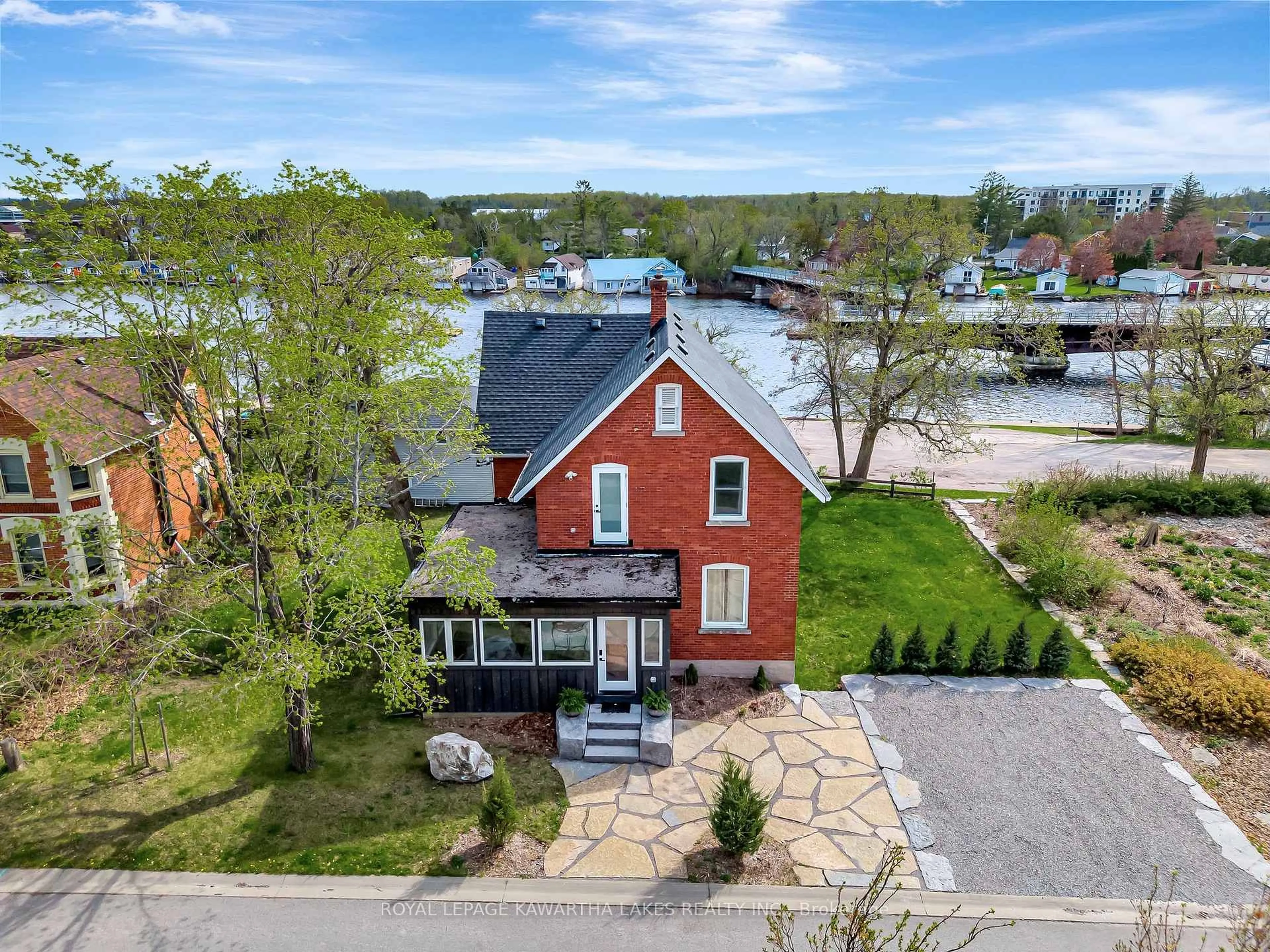 A pic from outside/outdoor area/front of a property/back of a property/a pic from drone, water/lake/river/ocean view for 45 OAK St, Kawartha Lakes Ontario K0M 1N0