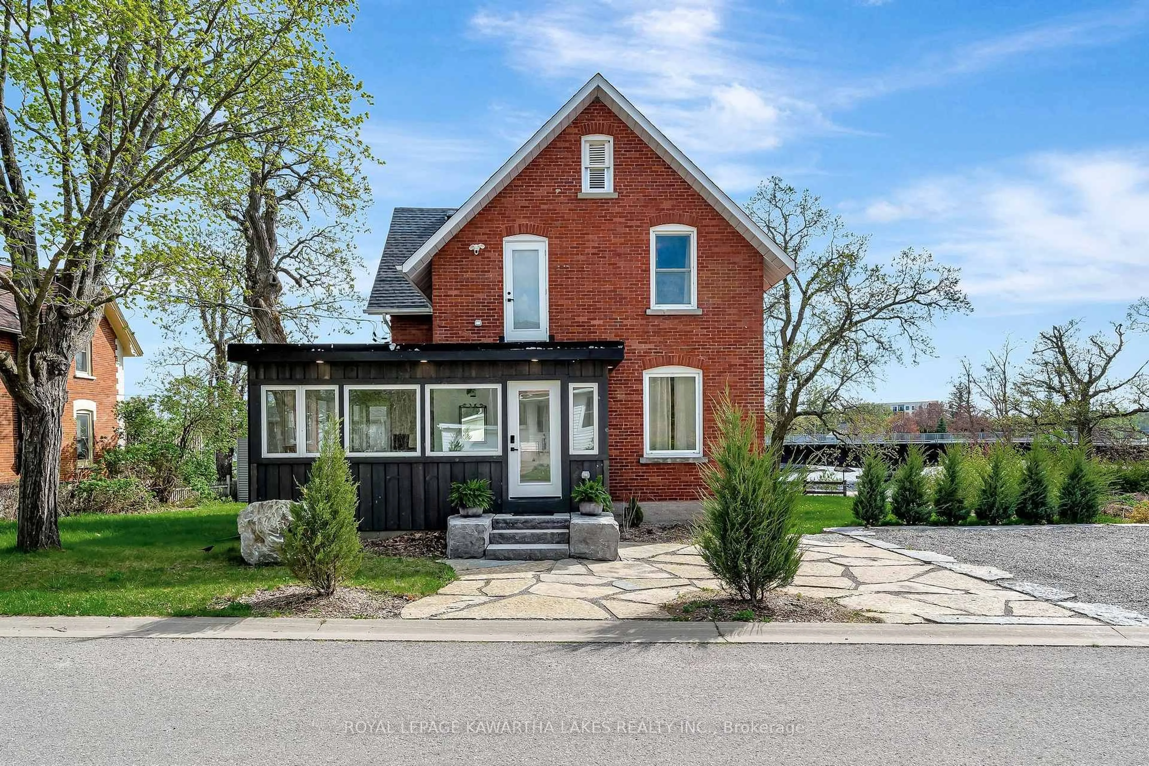 Home with brick exterior material, street for 45 OAK St, Kawartha Lakes Ontario K0M 1N0