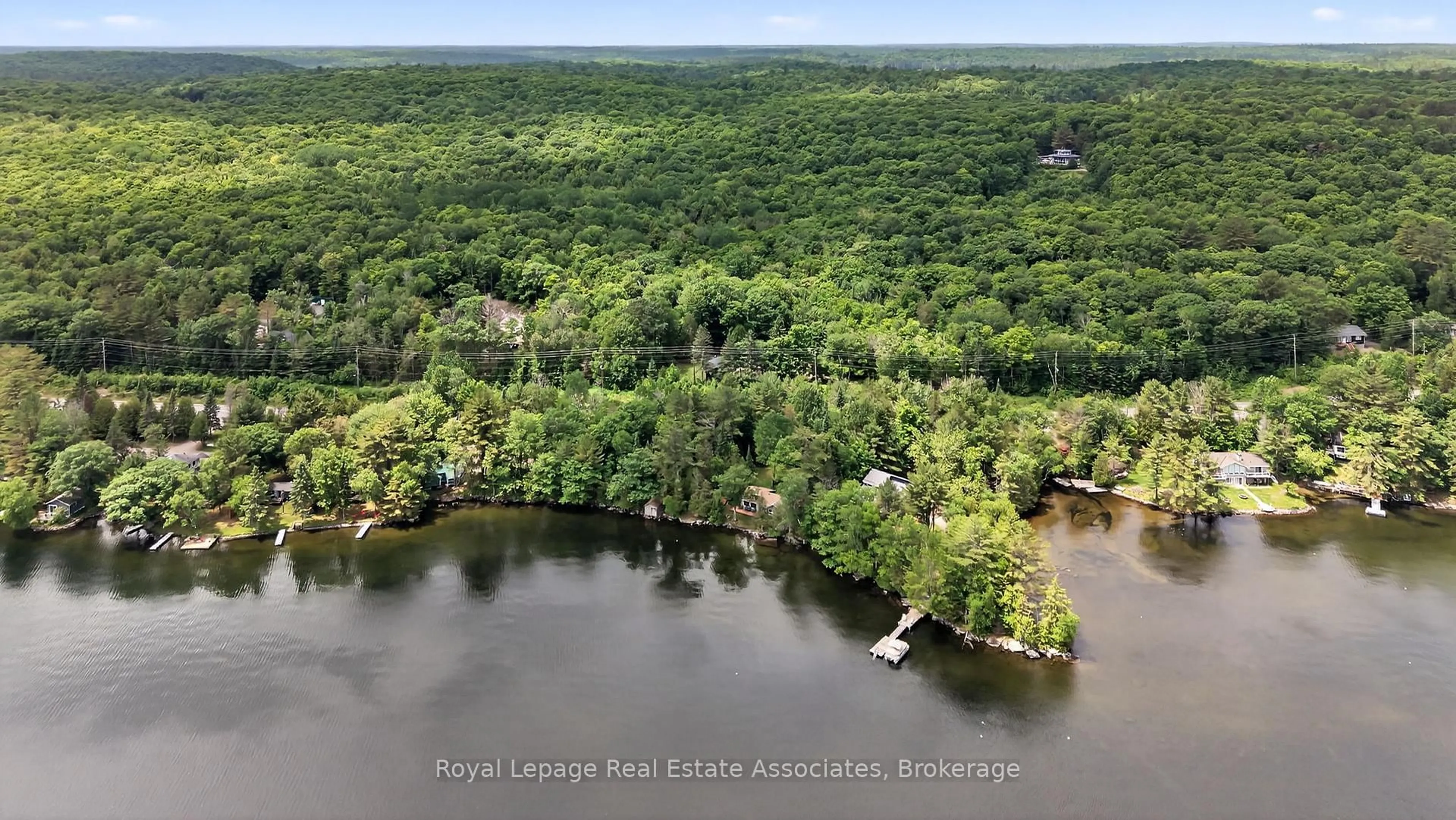 A pic from outside/outdoor area/front of a property/back of a property/a pic from drone, water/lake/river/ocean view for 17377 35 Highway, Algonquin Highlands Ontario K0M 1S0