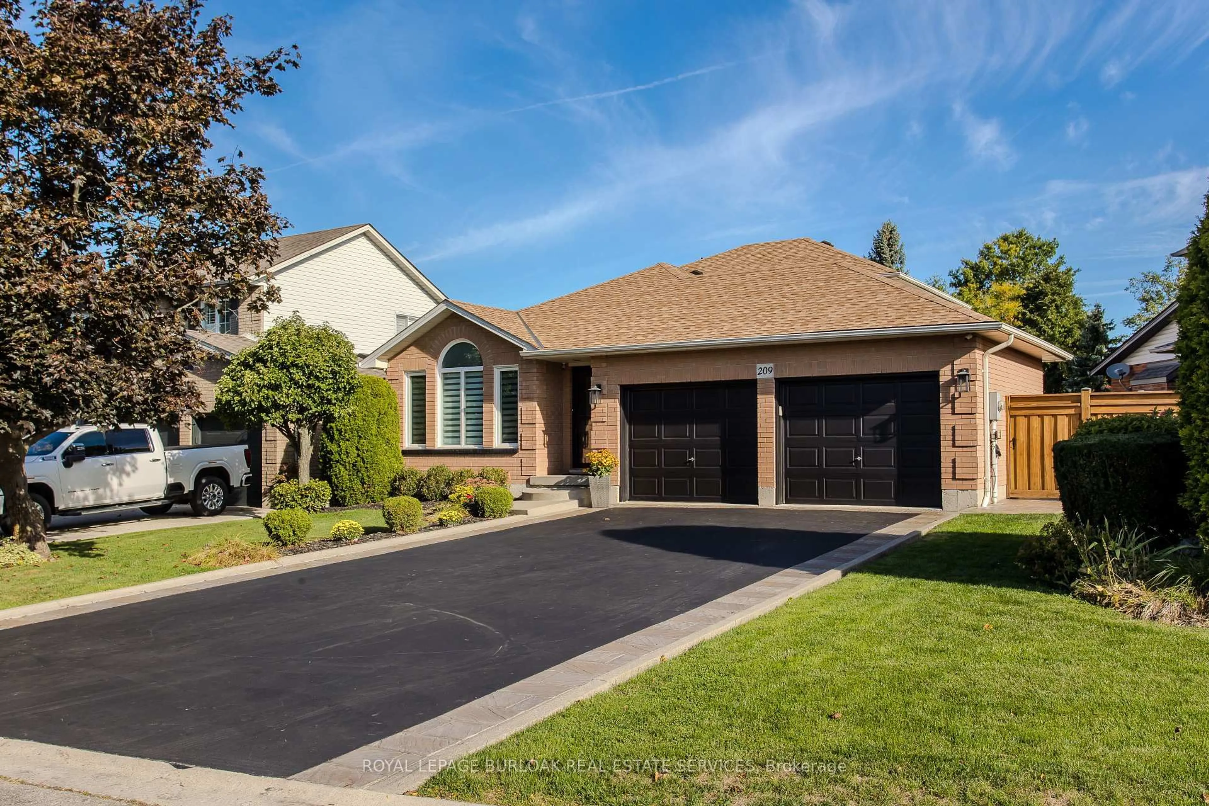 Home with brick exterior material, street for 209 Portage Lane, Hamilton Ontario L0R 1W0