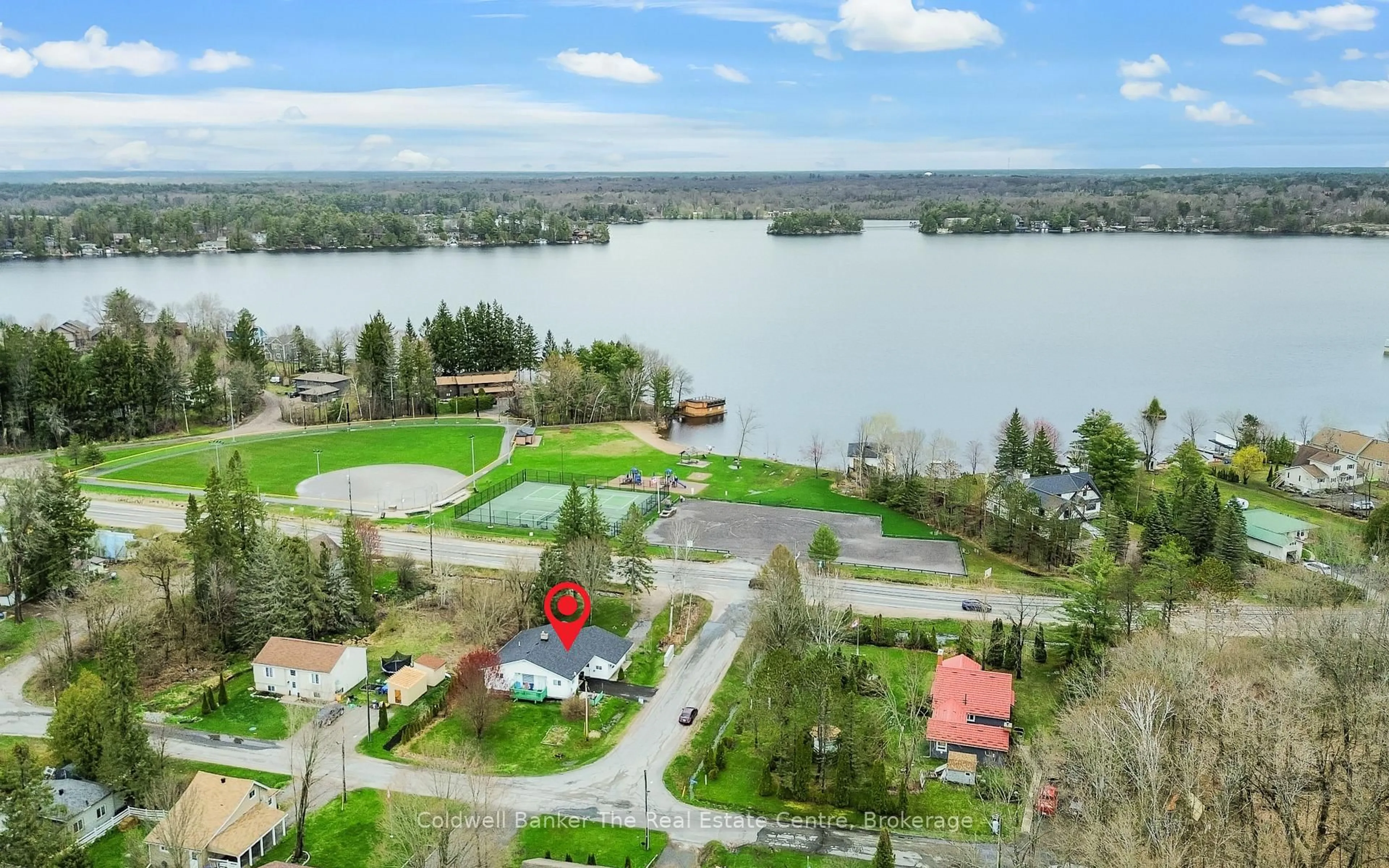 A pic from outside/outdoor area/front of a property/back of a property/a pic from drone, water/lake/river/ocean view for 100 Readman St, Gravenhurst Ontario P1P 1R2