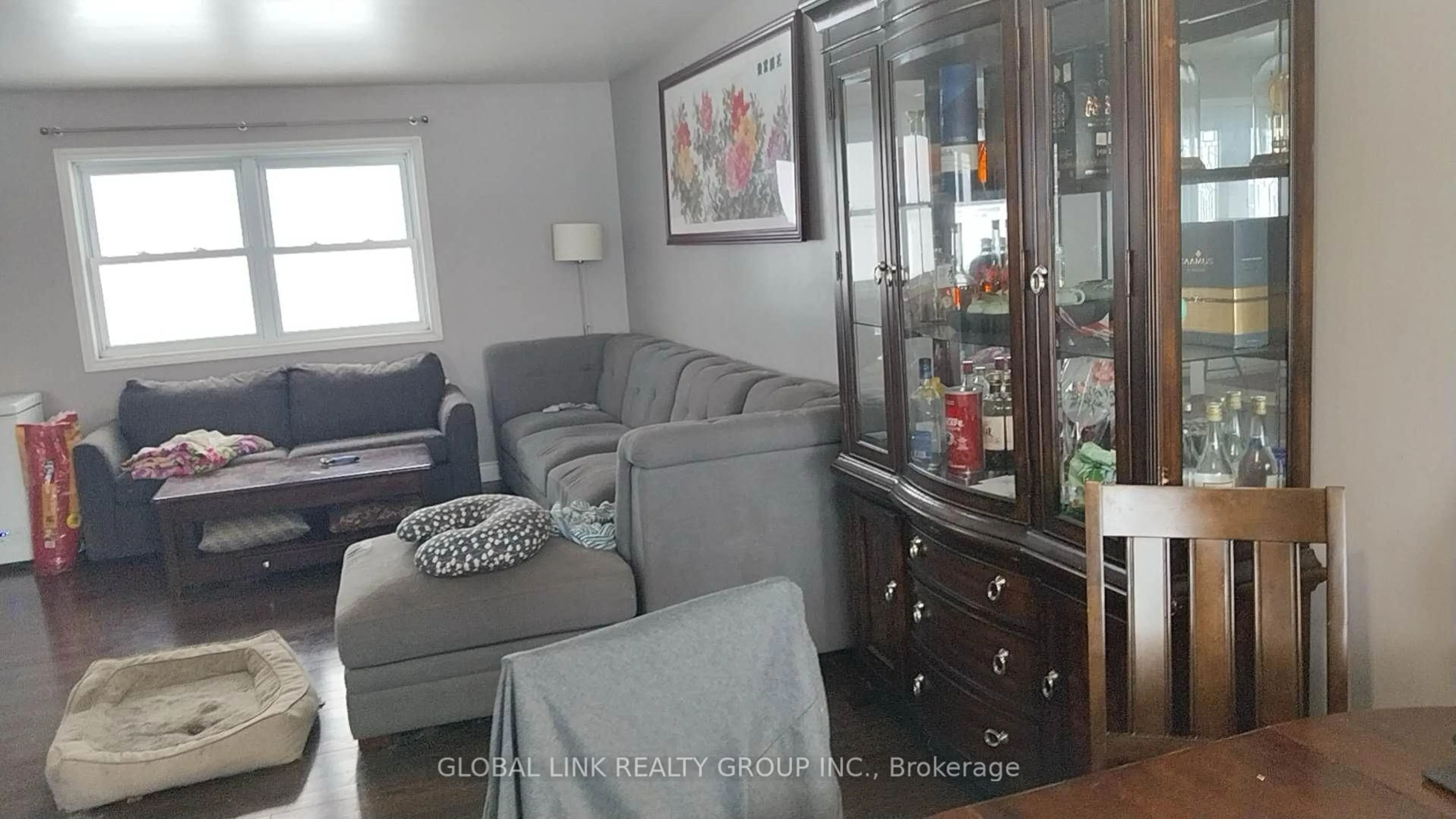 Living room with furniture, wood/laminate floor for 7223 Stevenson Rd, Elizabethtown-Kitley Ontario K6V 5T4