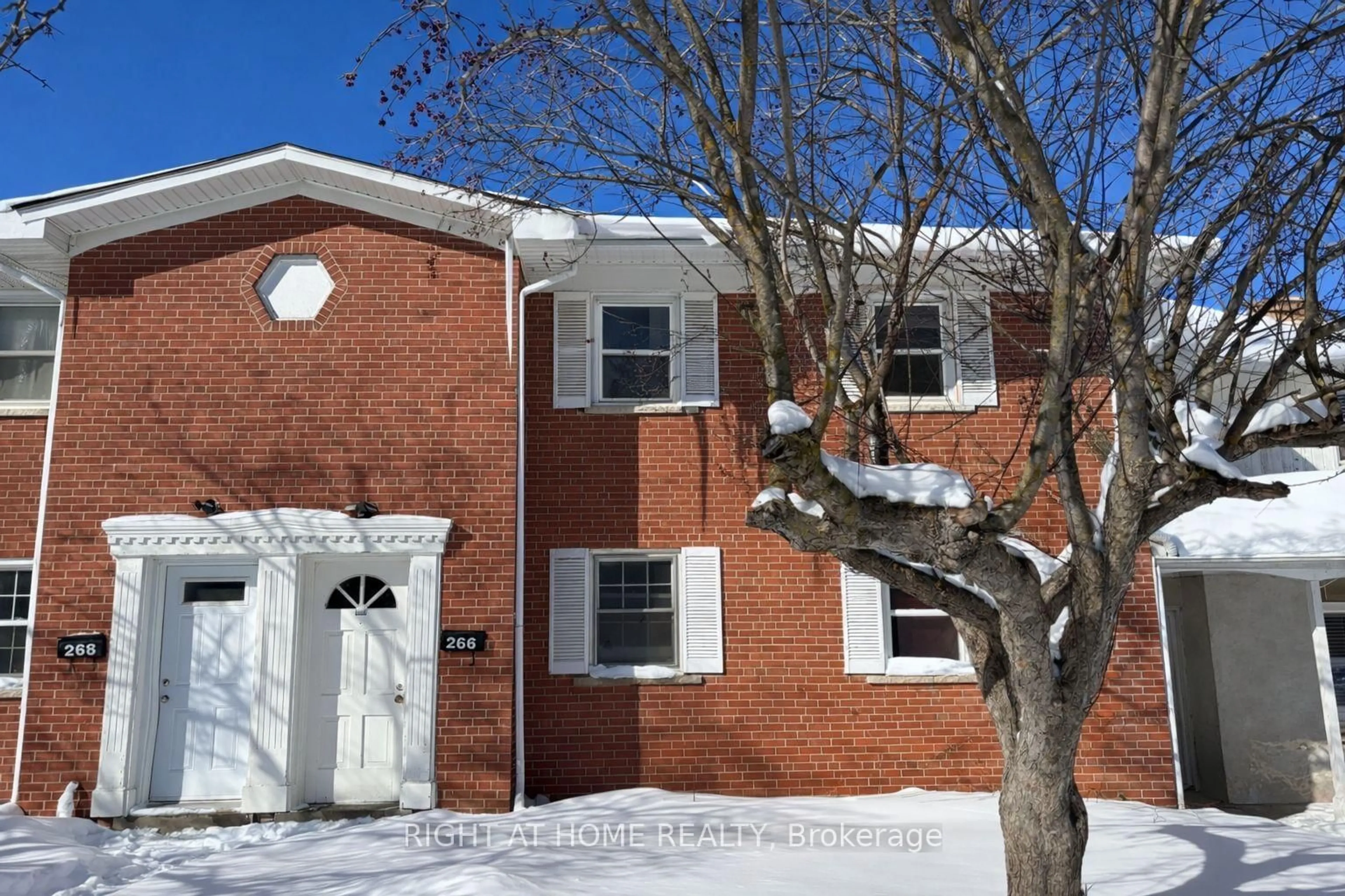 Home with brick exterior material, street for 266 Westcourt Pl, Waterloo Ontario N2L 2R7