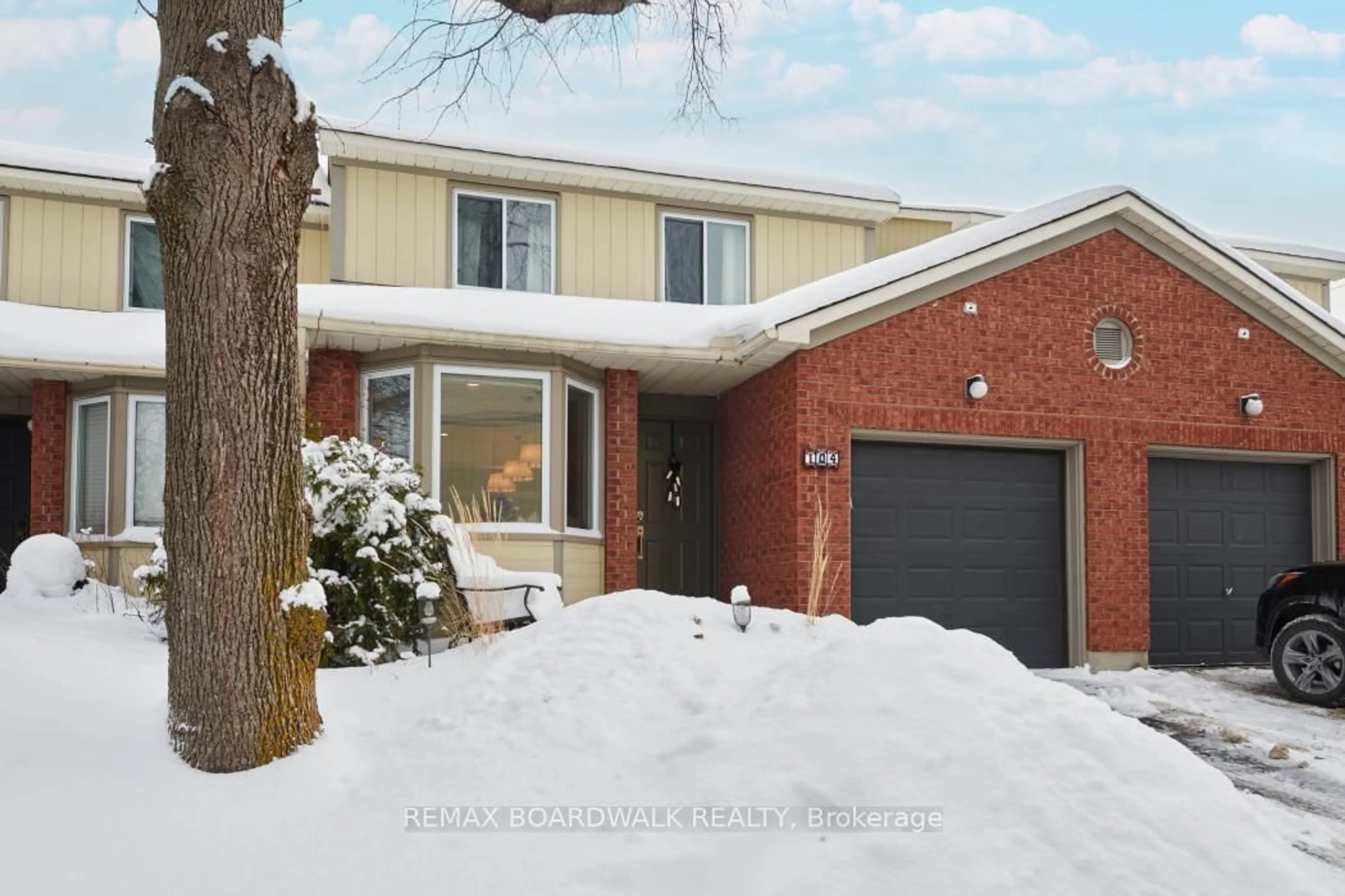Home with brick exterior material, street for 104 Cheltenham Private #3, Ottawa Ontario K1V 0L6