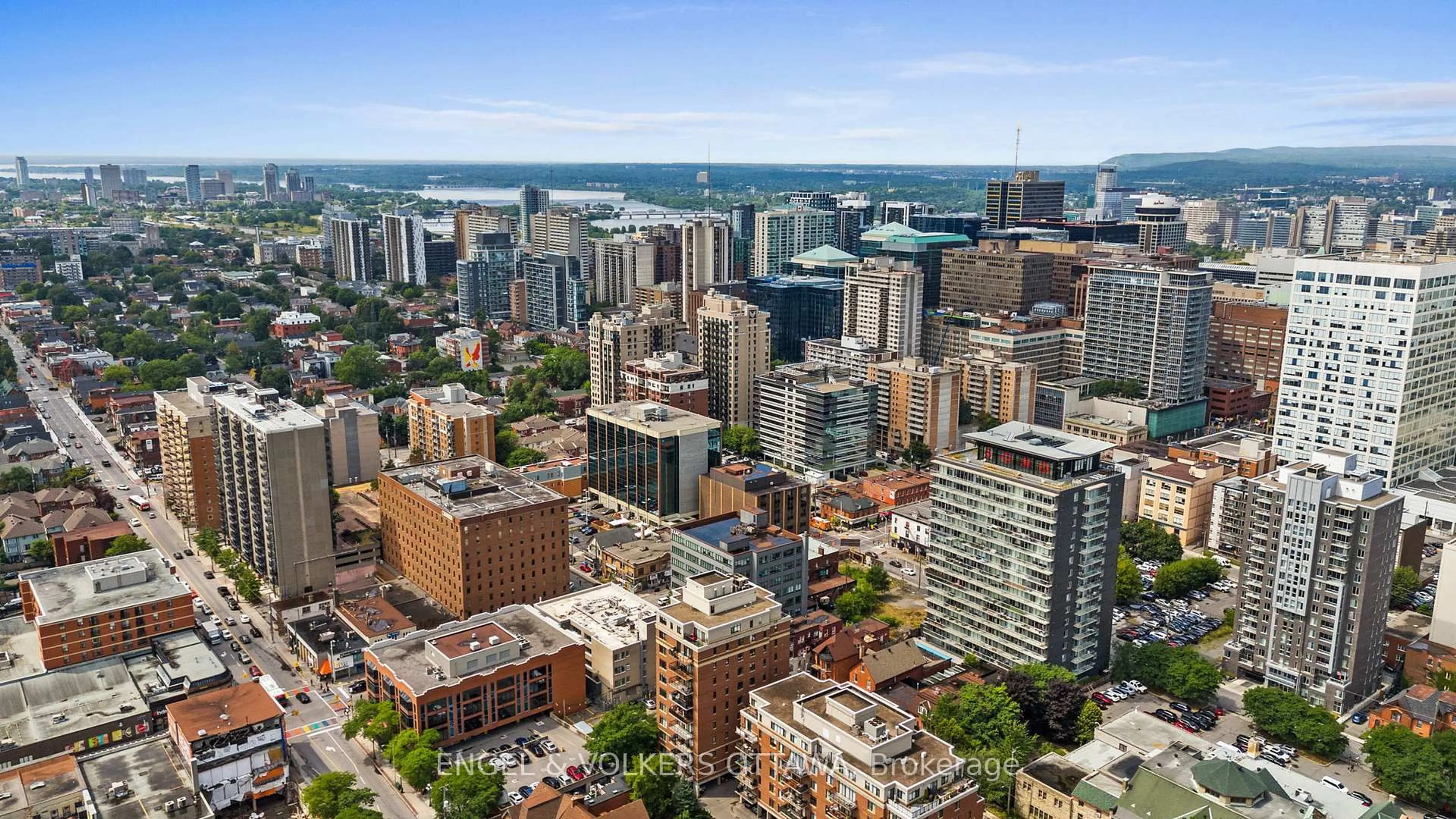 A pic from outside/outdoor area/front of a property/back of a property/a pic from drone, city buildings view from balcony for 374 Cooper St #703, Ottawa Ontario K2P 2P4