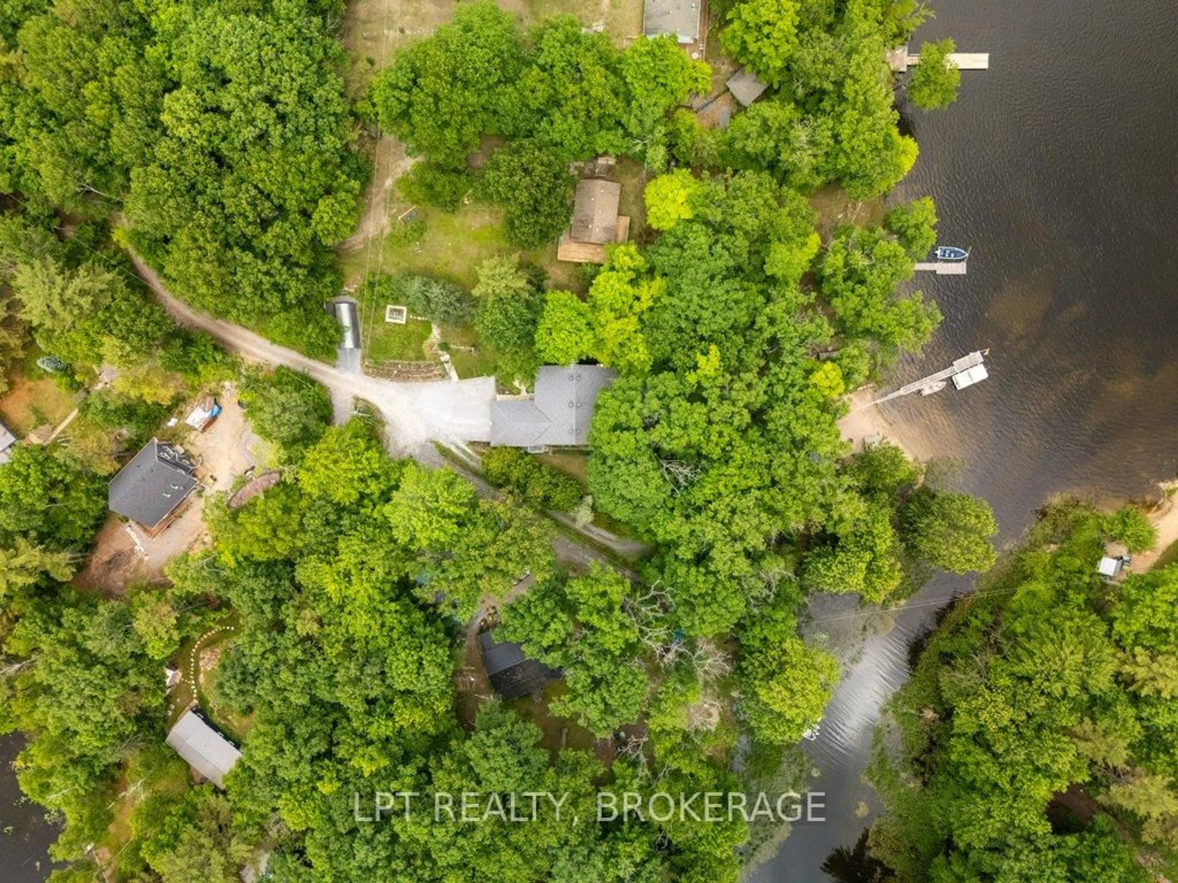 A pic from outside/outdoor area/front of a property/back of a property/a pic from drone, water/lake/river/ocean view for 31 Acorn Lane, Tichborne Ontario K0H 2V0