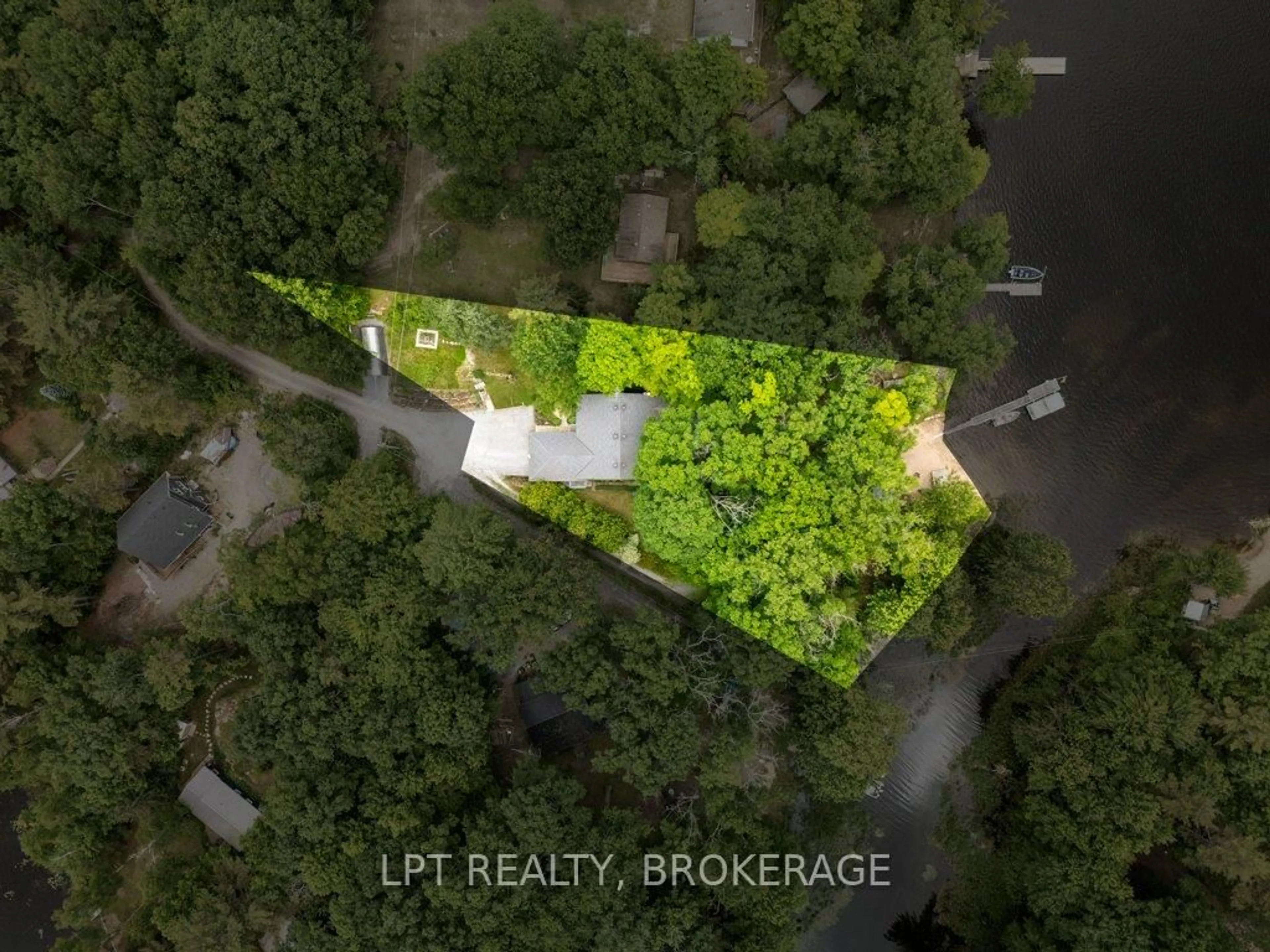 A pic from outside/outdoor area/front of a property/back of a property/a pic from drone, water/lake/river/ocean view for 31 Acorn Lane, Tichborne Ontario K0H 2V0