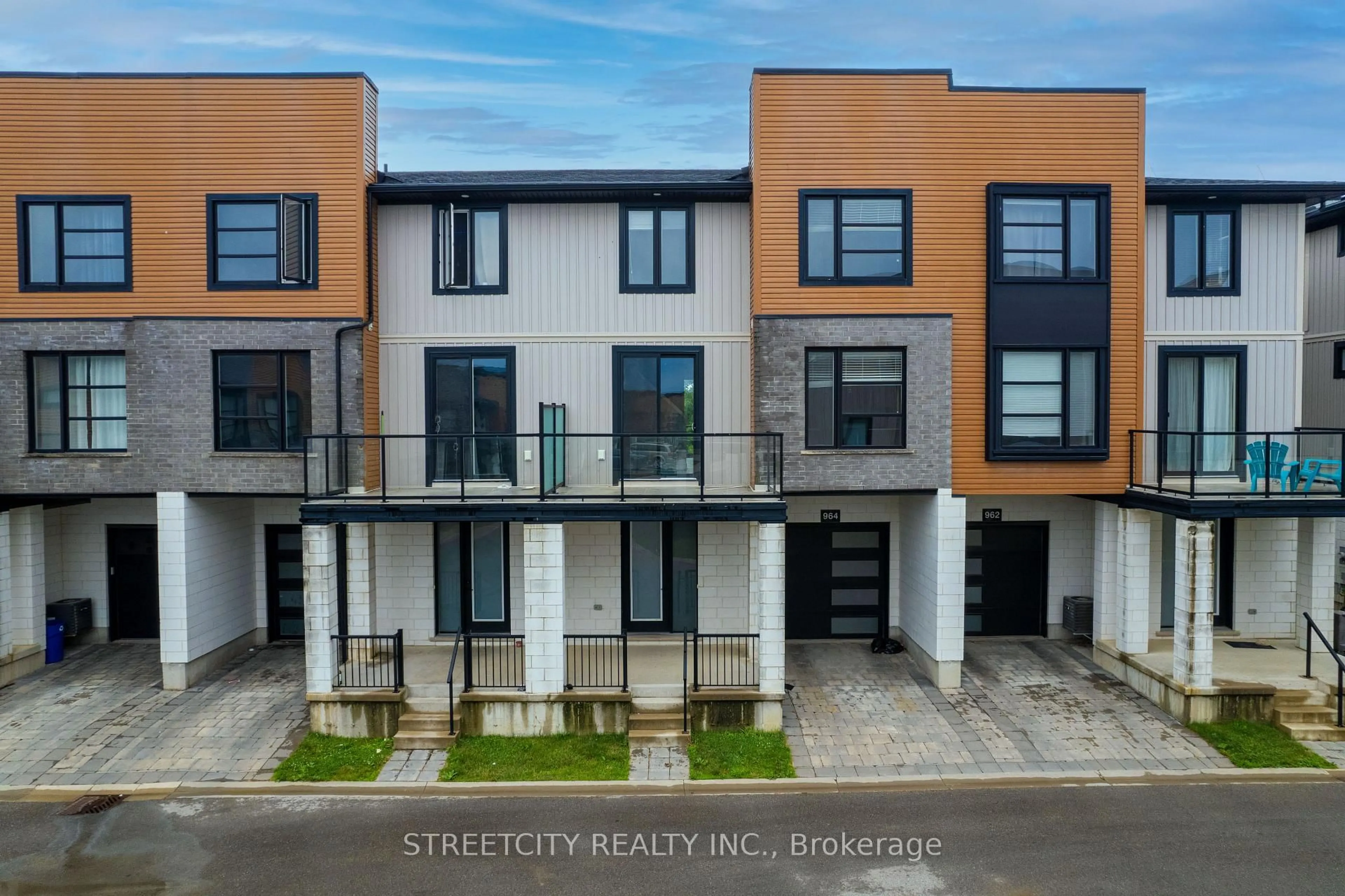 A pic from outside/outdoor area/front of a property/back of a property/a pic from drone, street for 964 West Village Sq, London North Ontario N6H 0J7