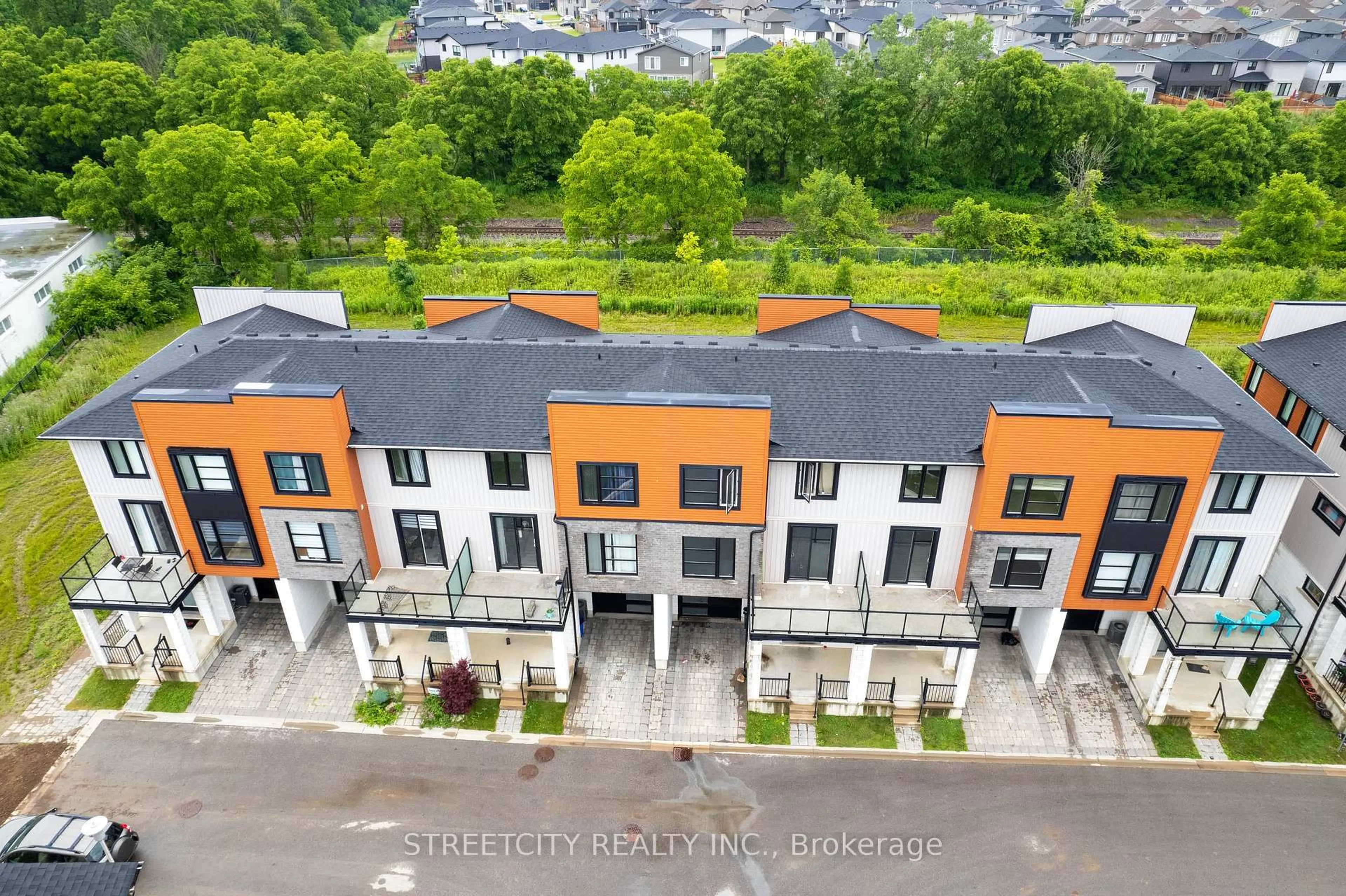 A pic from outside/outdoor area/front of a property/back of a property/a pic from drone, city buildings view from balcony for 964 West Village Sq, London North Ontario N6H 0J7