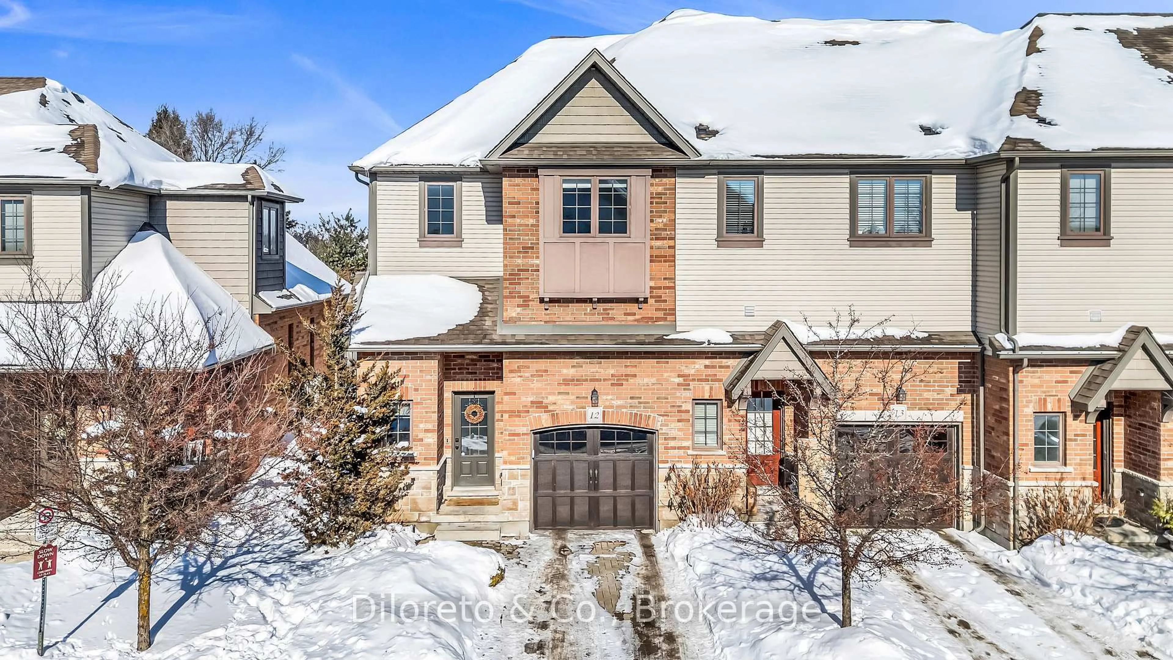 Home with brick exterior material, street for 146 Downey Rd #12, Guelph Ontario N1C 0A2