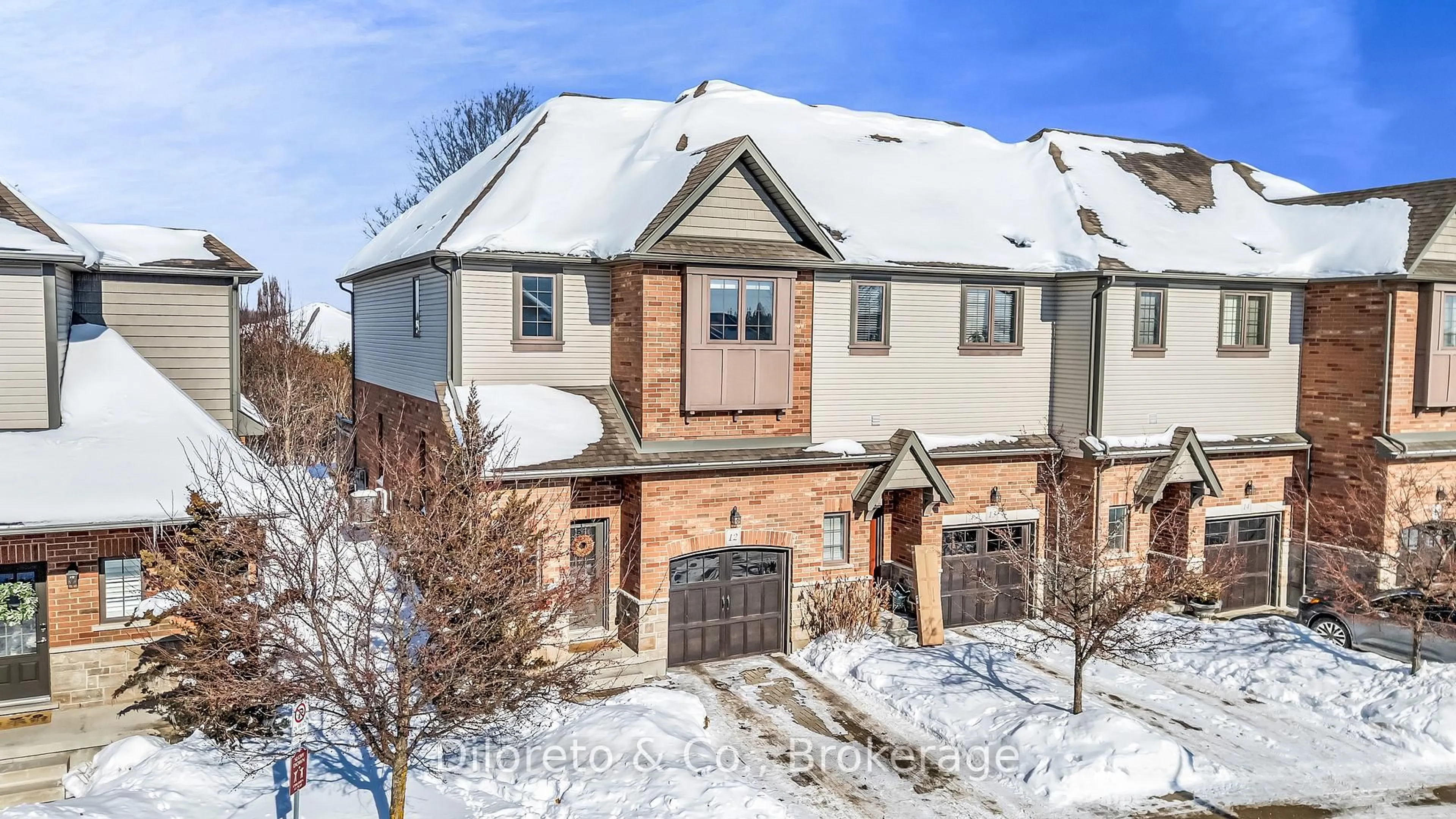 A pic from outside/outdoor area/front of a property/back of a property/a pic from drone, street for 146 Downey Rd #12, Guelph Ontario N1C 0A2