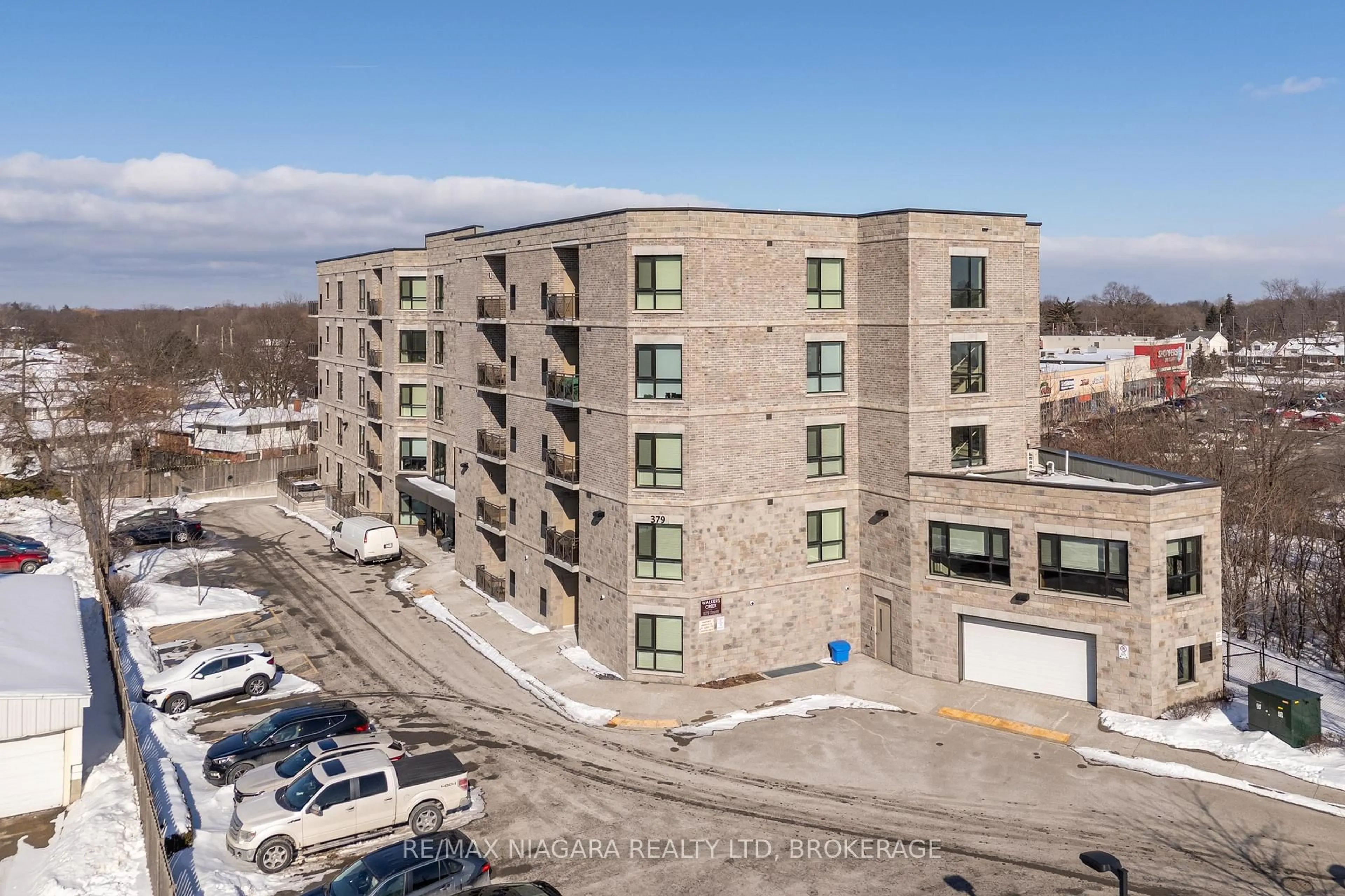 A pic from outside/outdoor area/front of a property/back of a property/a pic from drone, building for 379 Scott St #209, St. Catharines Ontario L2M 3W2