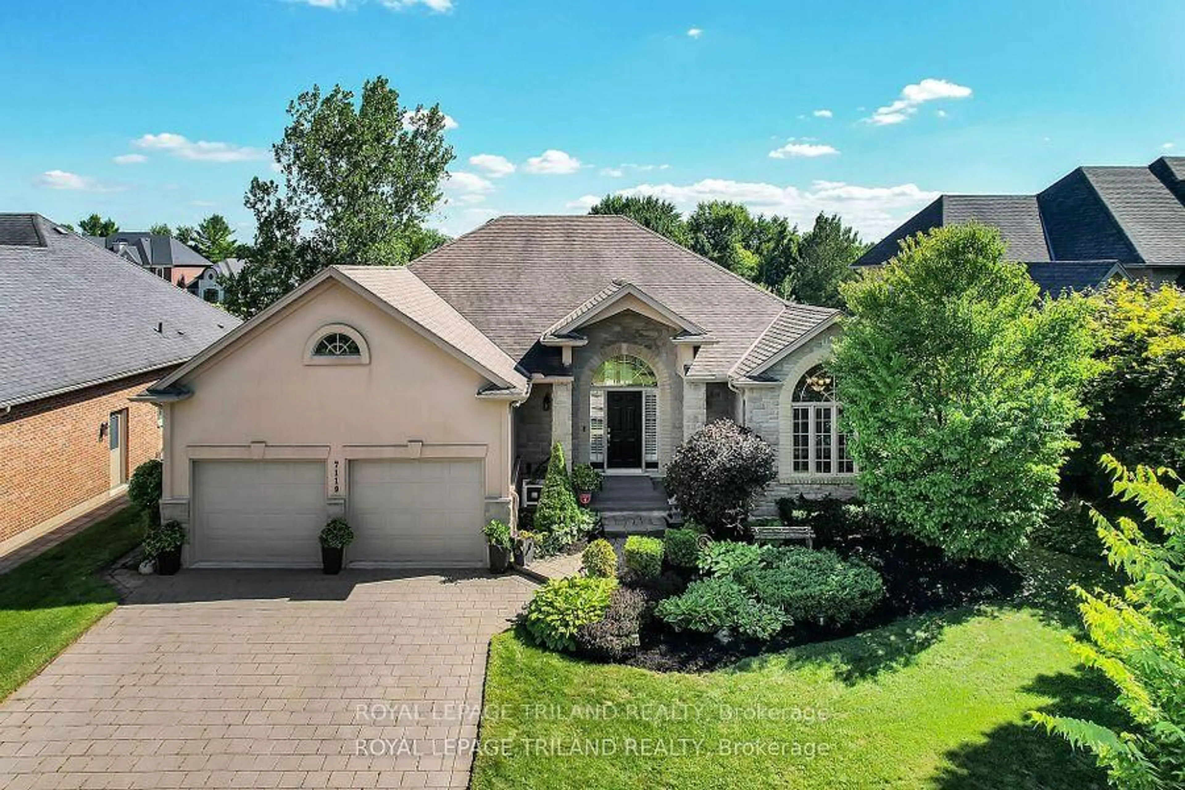 Home with brick exterior material, street for 7119 Clayton Walk, London South Ontario N6P 1V3