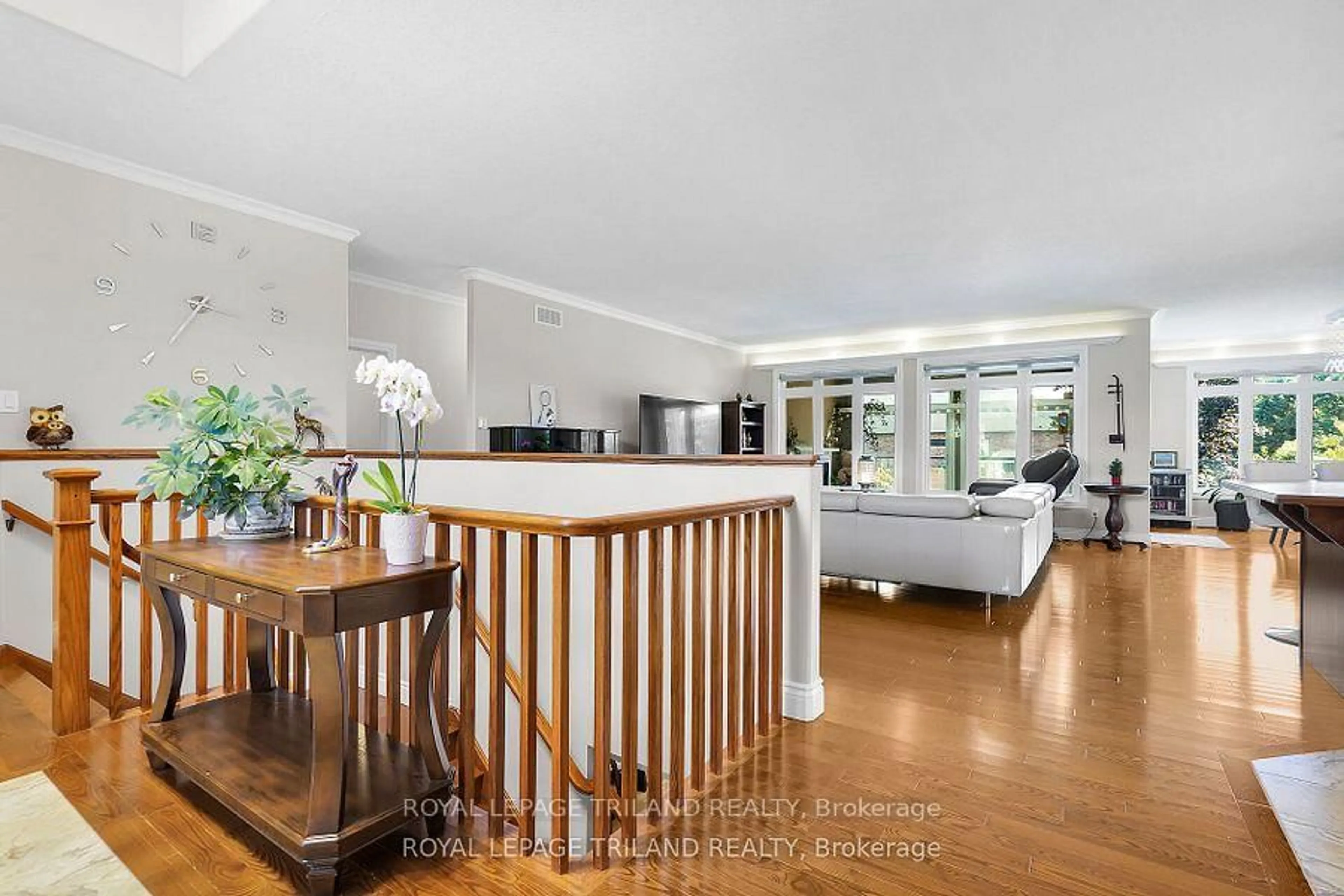 Open concept kitchen, wood/laminate floor for 7119 Clayton Walk, London South Ontario N6P 1V3