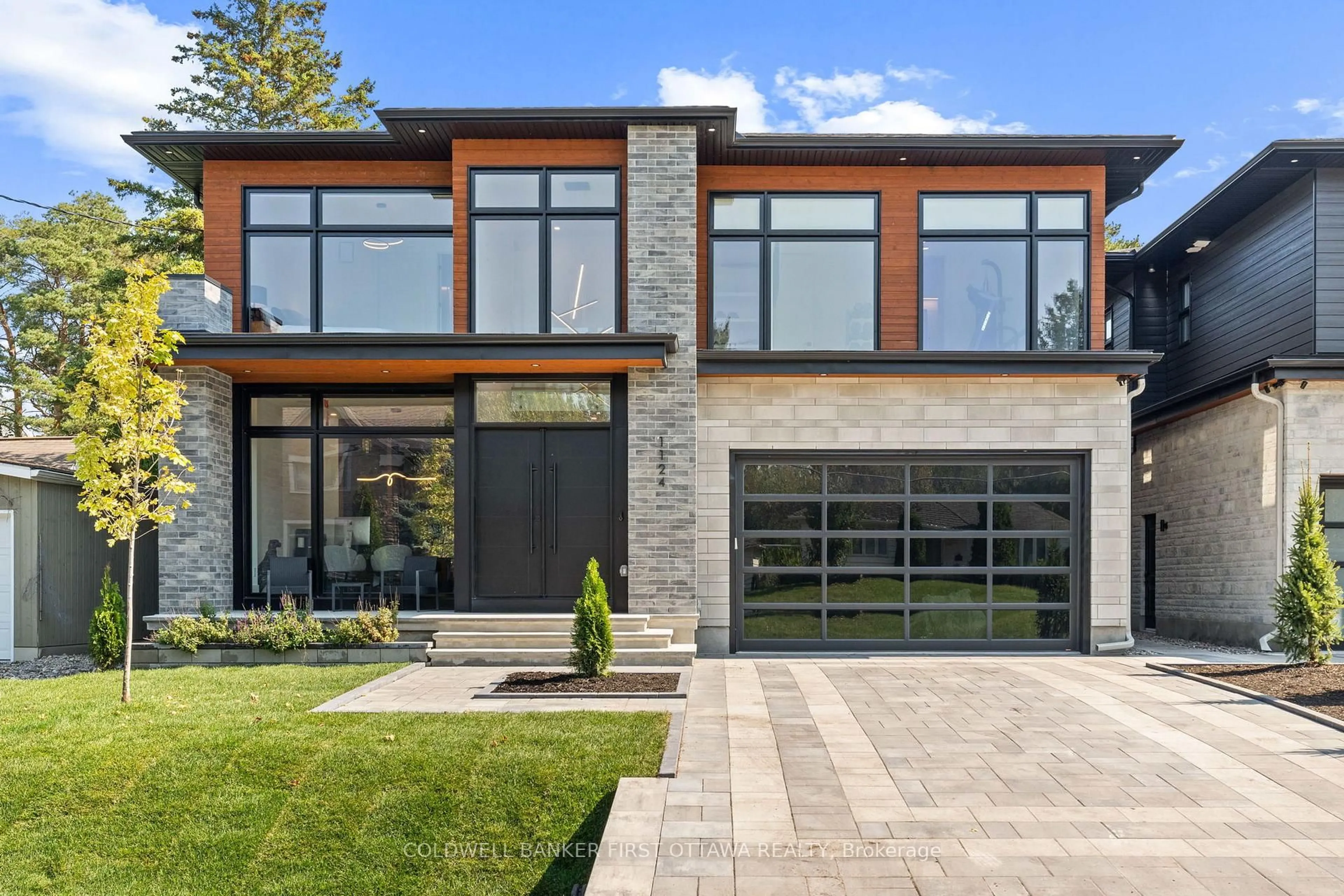 Home with brick exterior material, street for 1124 Normandy Cres, Ottawa Ontario K2E 5A4