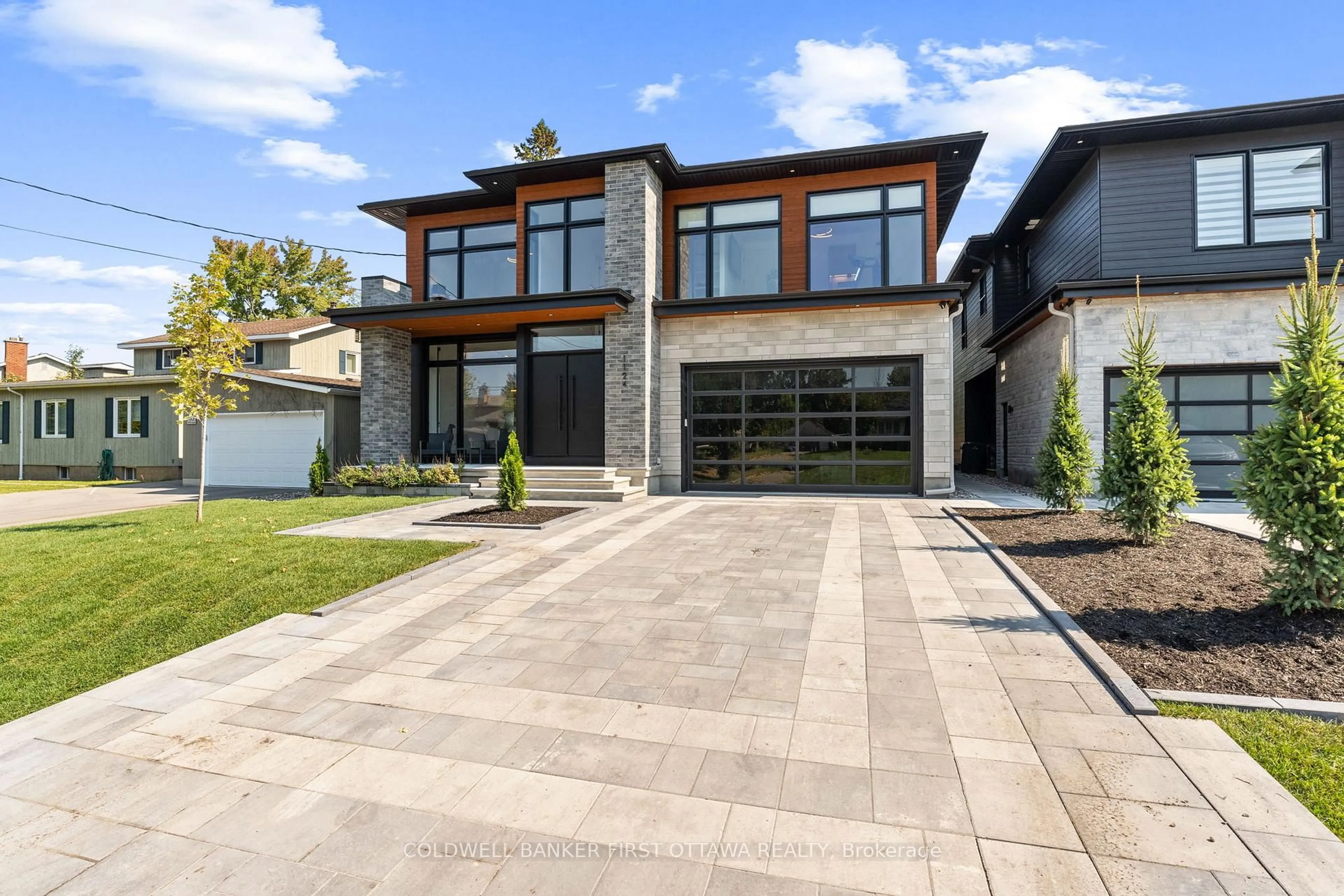 Home with brick exterior material, street for 1124 Normandy Cres, Ottawa Ontario K2E 5A4