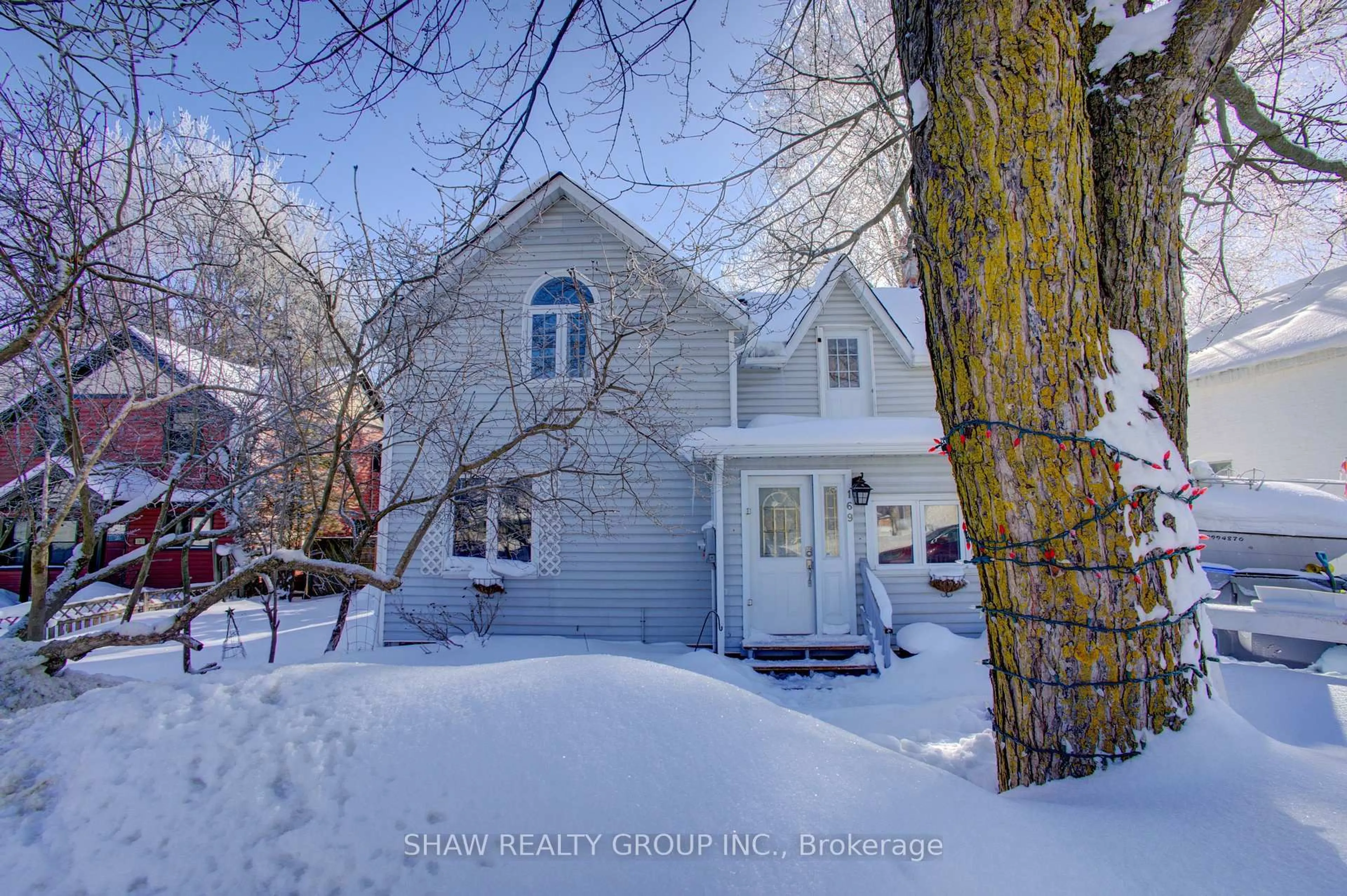 A pic from outside/outdoor area/front of a property/back of a property/a pic from drone, street for 169 Main St, North Perth Ontario N0G 1B0
