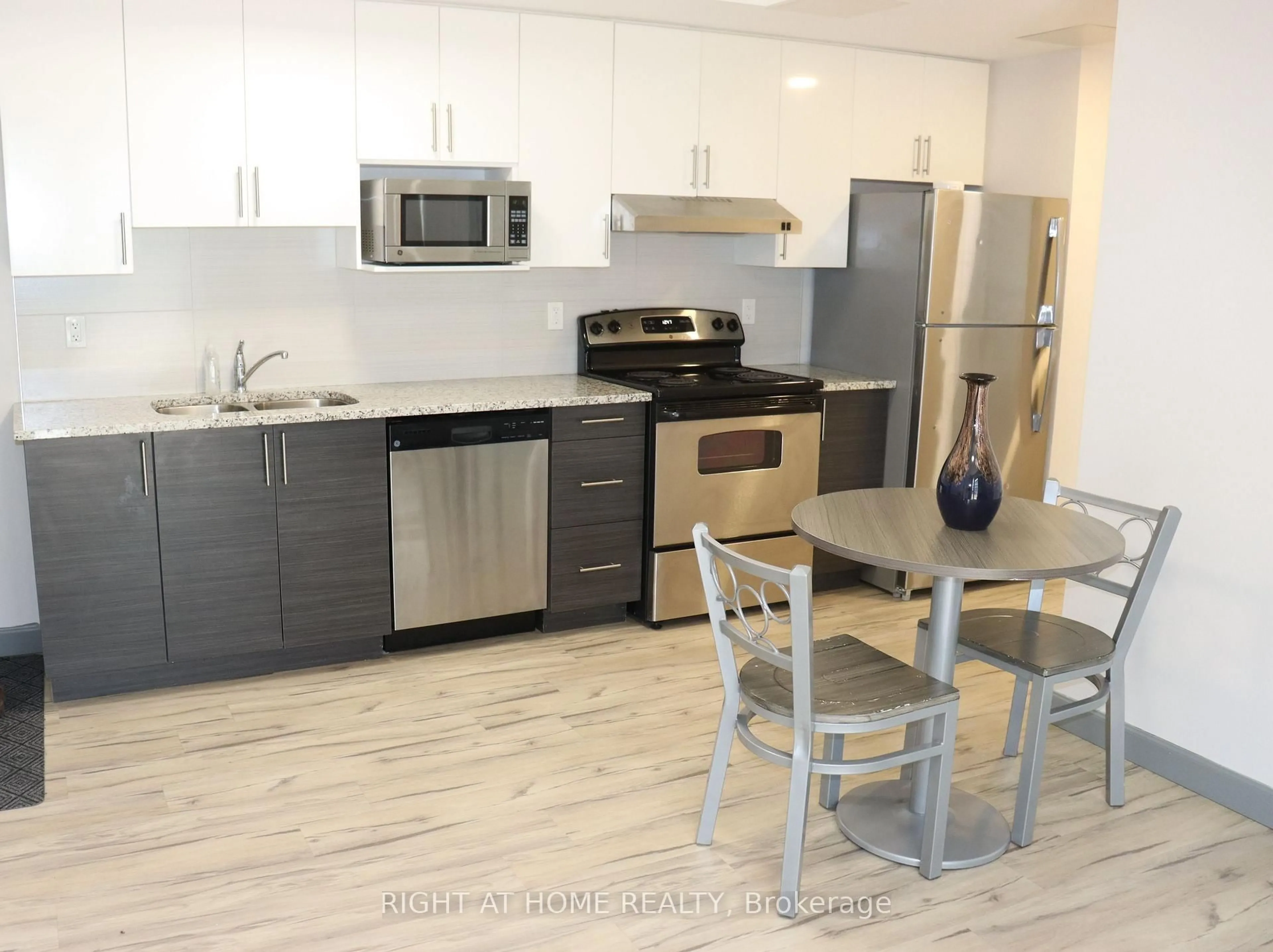 Standard kitchen, wood/laminate floor for 258B Sunview St #215, Waterloo Ontario N2L 3V9