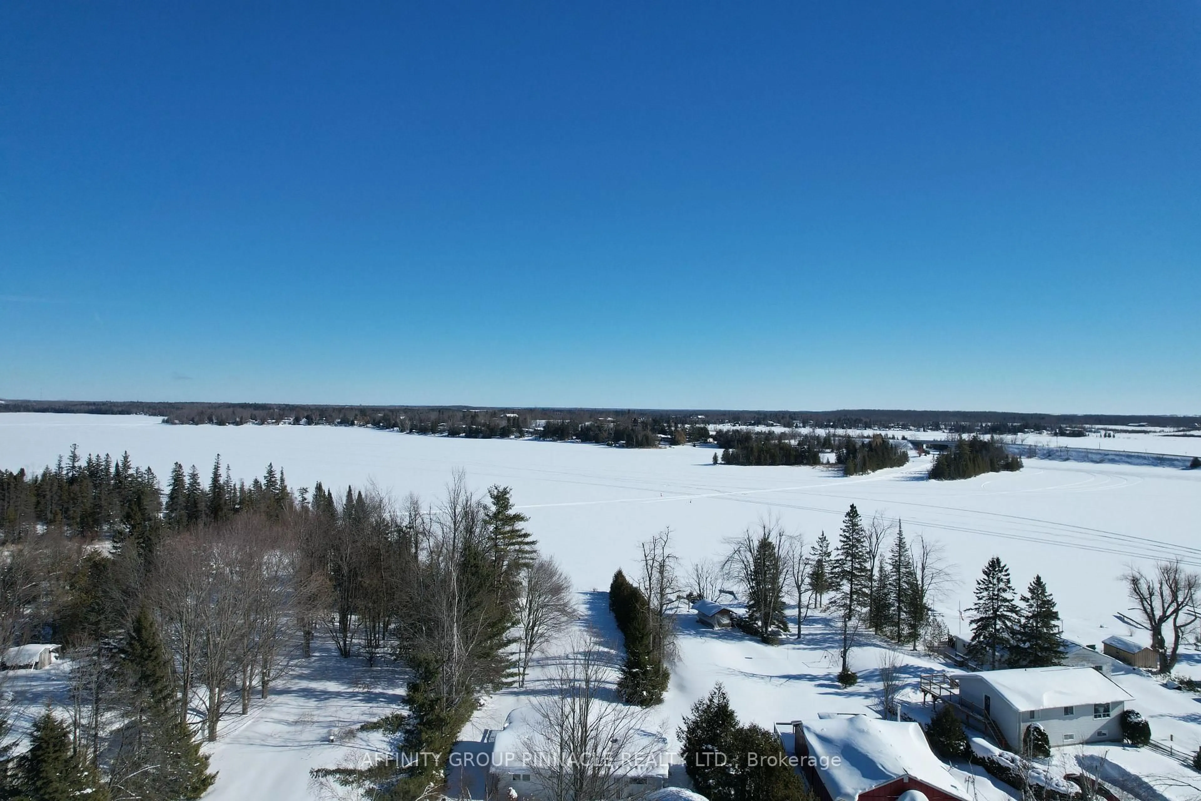 A pic from outside/outdoor area/front of a property/back of a property/a pic from drone, water/lake/river/ocean view for 10 Ewen St, Kawartha Lakes Ontario K0M 2B0