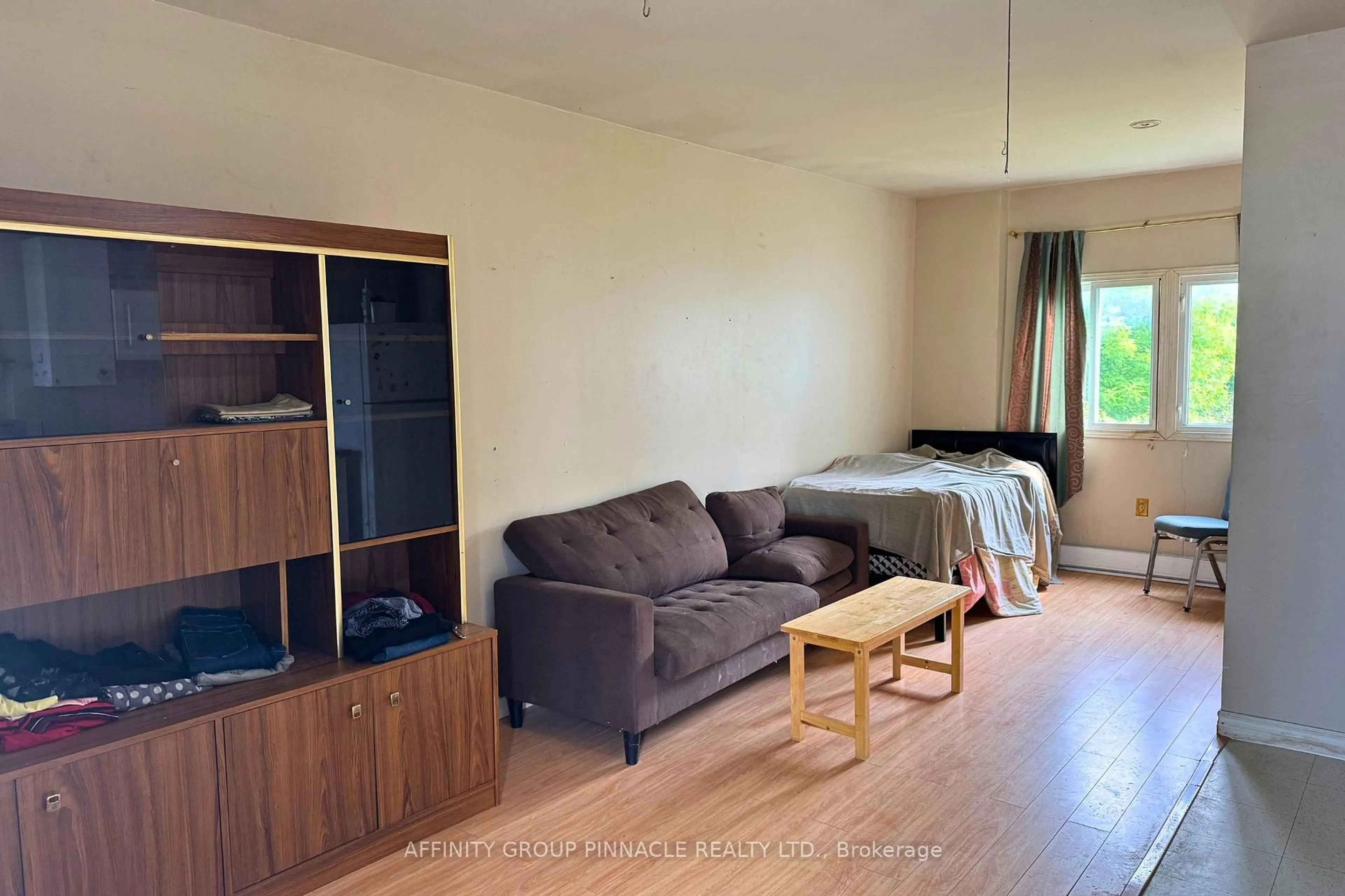 Living room with furniture, wood/laminate floor for 88 Albert St, Kawartha Lakes Ontario K9V 3H6