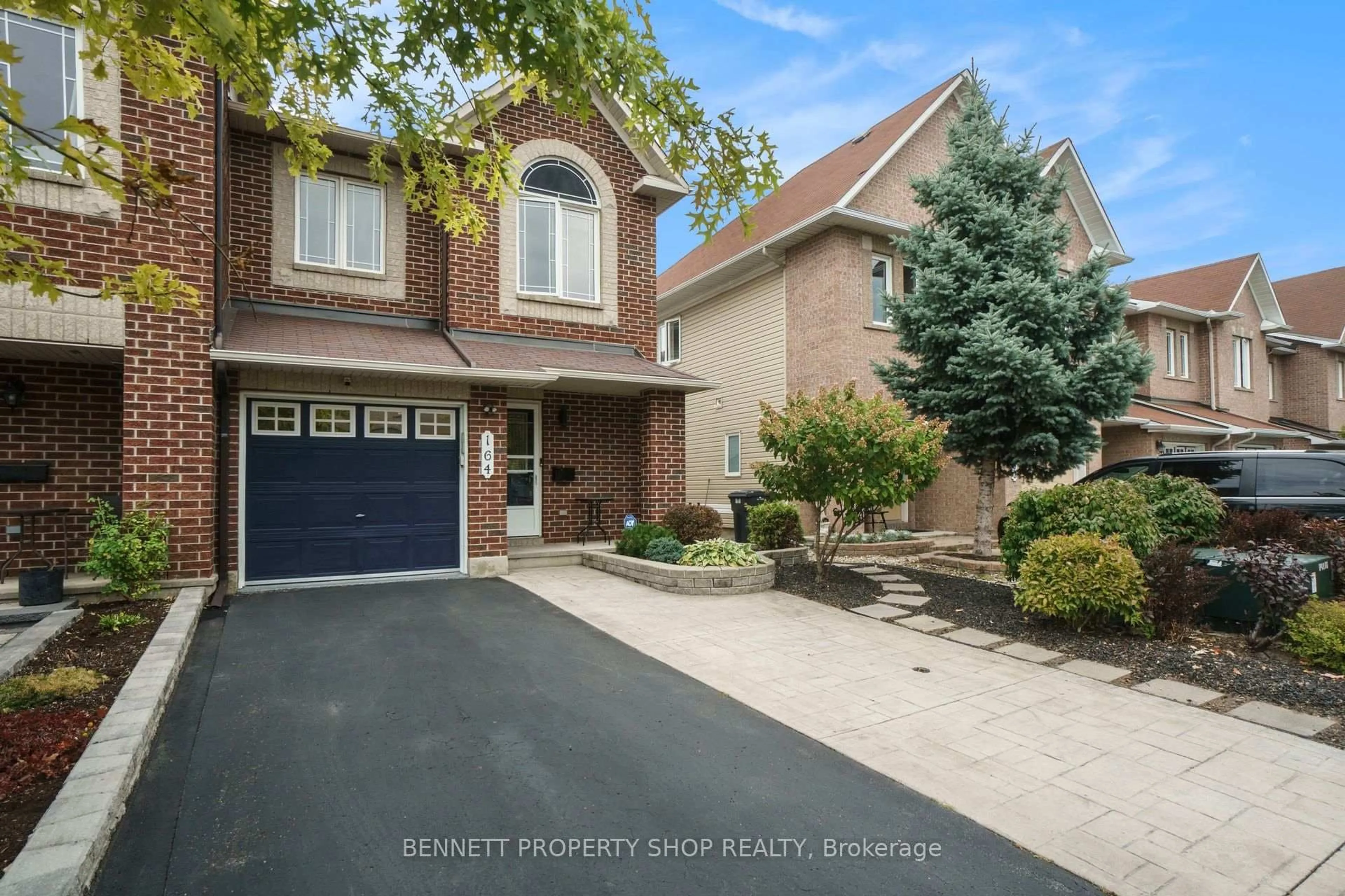 Home with brick exterior material, street for 164 Tacom Circ, Ottawa Ontario K2G 4R1