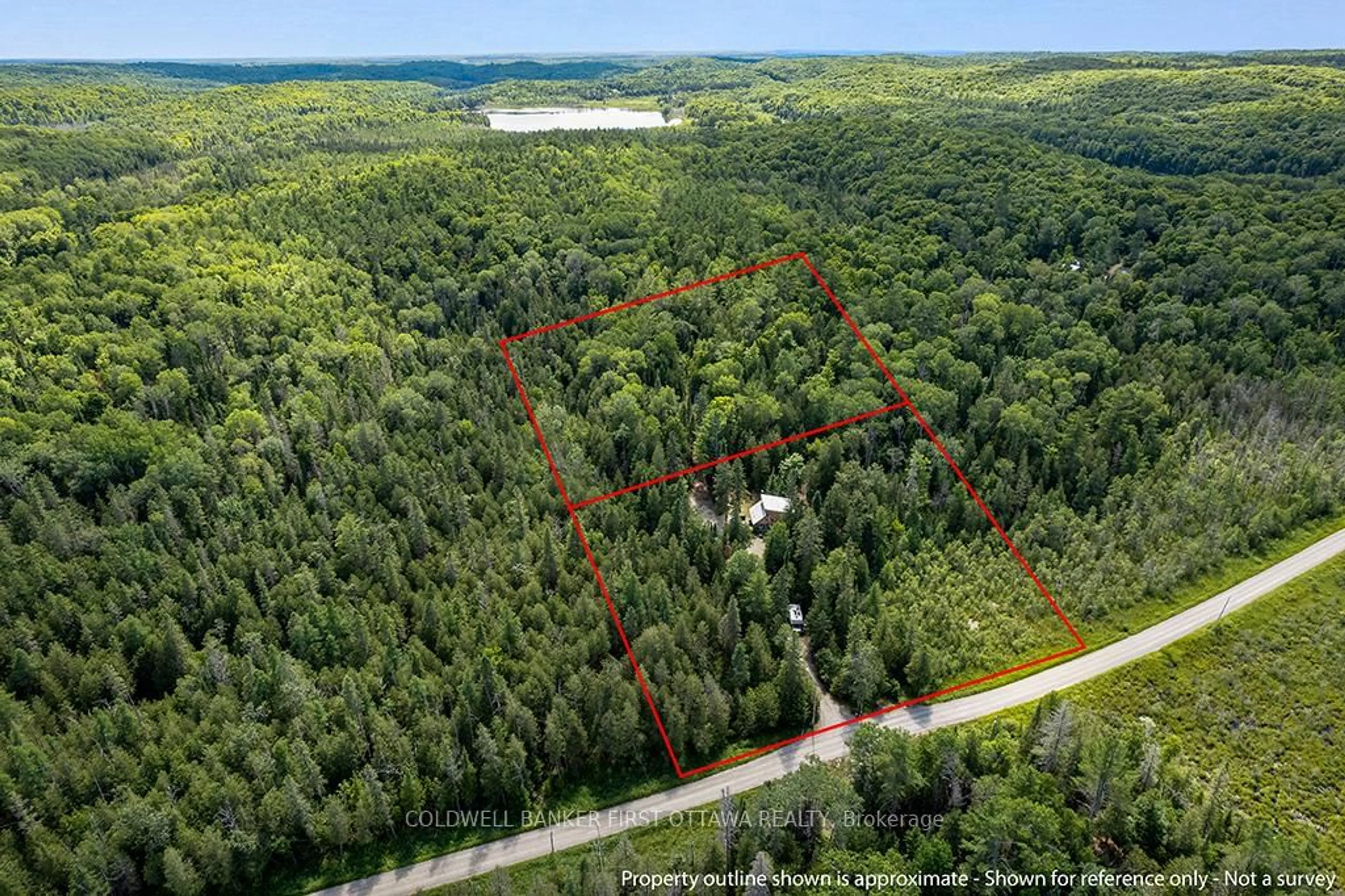 A pic from outside/outdoor area/front of a property/back of a property/a pic from drone, forest/trees view for 1169 Mosque Lake Rd, Ompah Ontario K0H 2J0