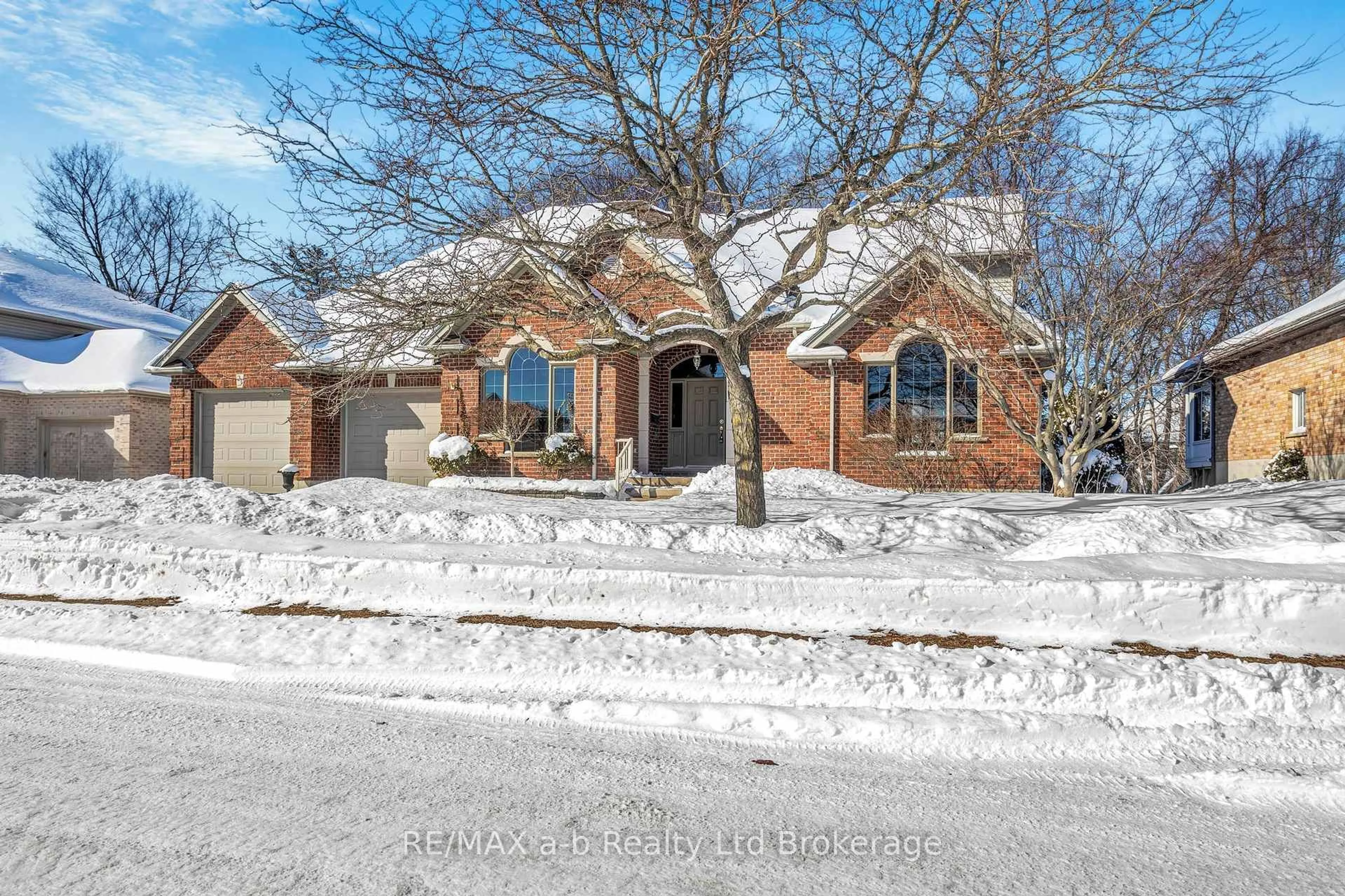Home with brick exterior material, street for 21 Windemere Ave, Tillsonburg Ontario N4G 5M8