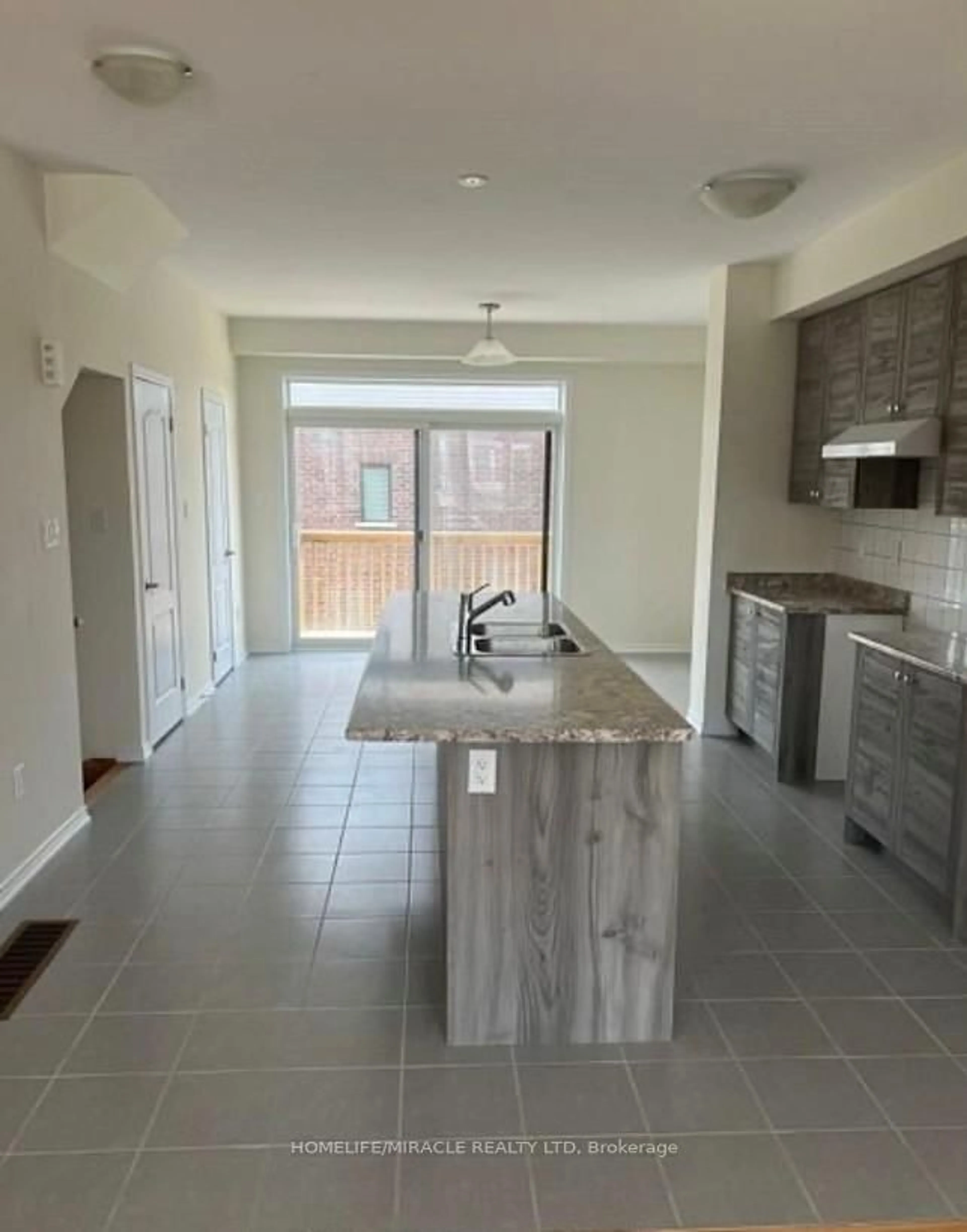 Open concept kitchen, ceramic/tile floor for 4 Baskett Dr, Brantford Ontario N3T 5L5