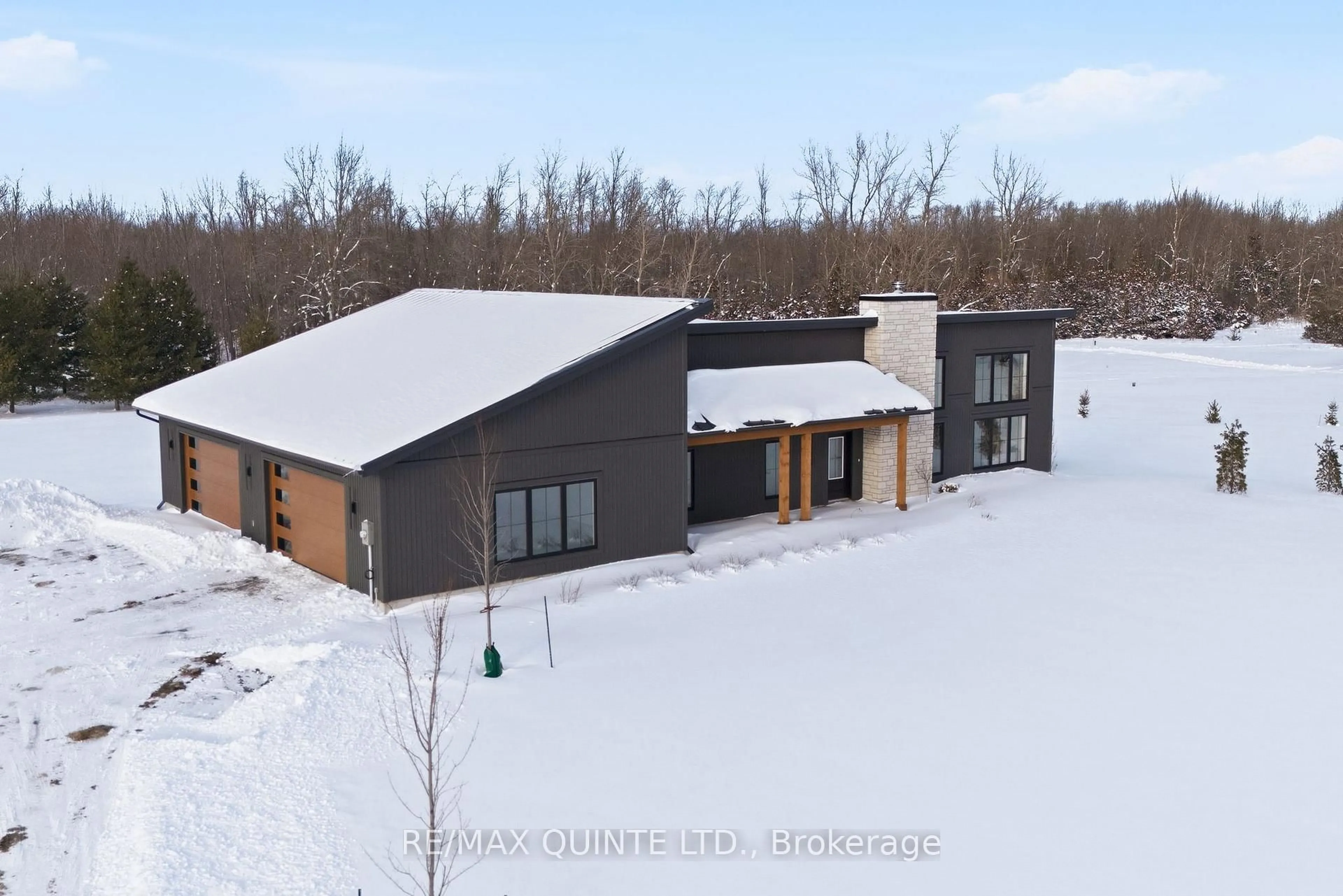 A pic from outside/outdoor area/front of a property/back of a property/a pic from drone, building for 225 Mitchells Crossroad, Prince Edward County Ontario K0K 2T0