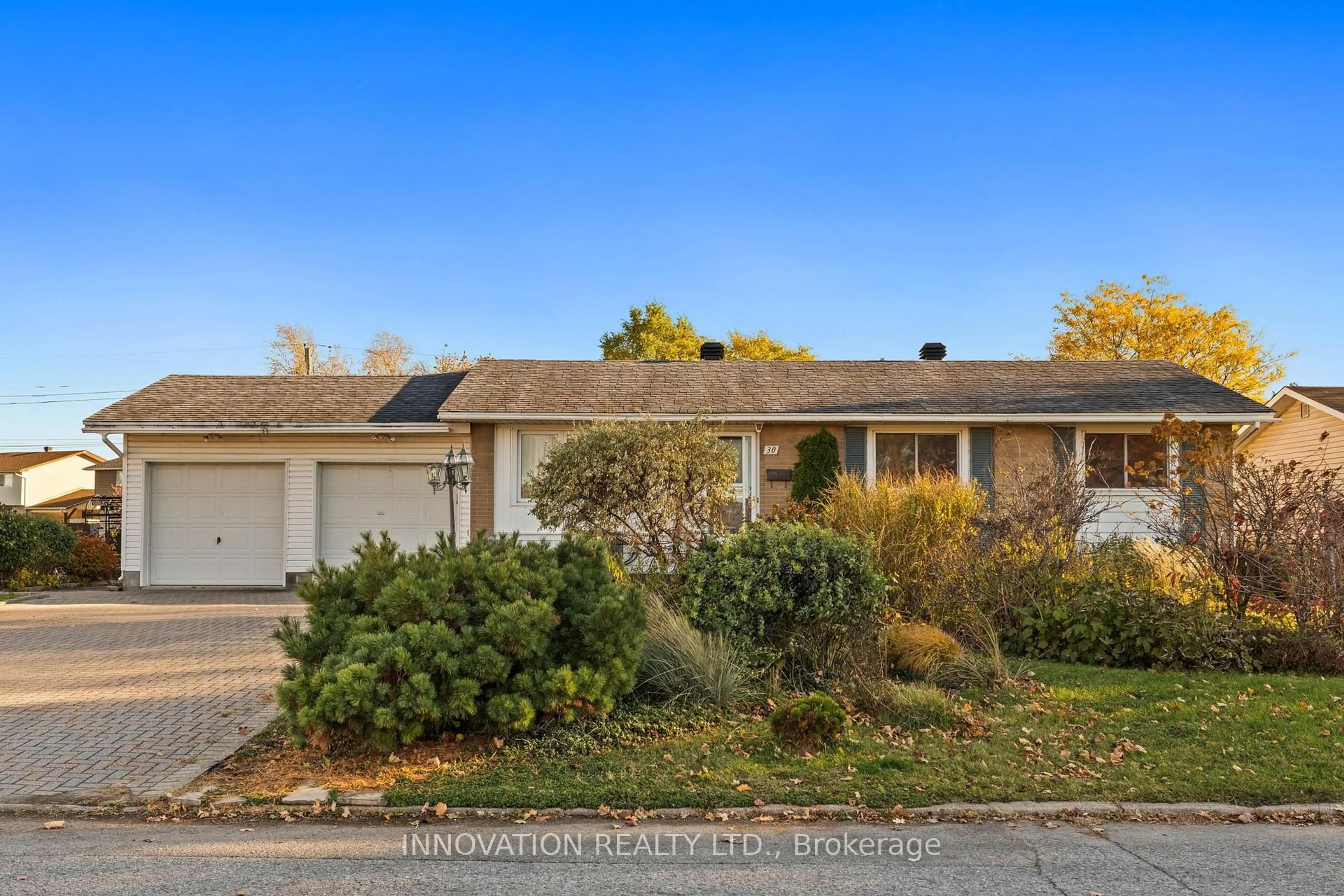 Home with vinyl exterior material, street for 30 Oakview Ave, Ottawa Ontario K2G 3A2