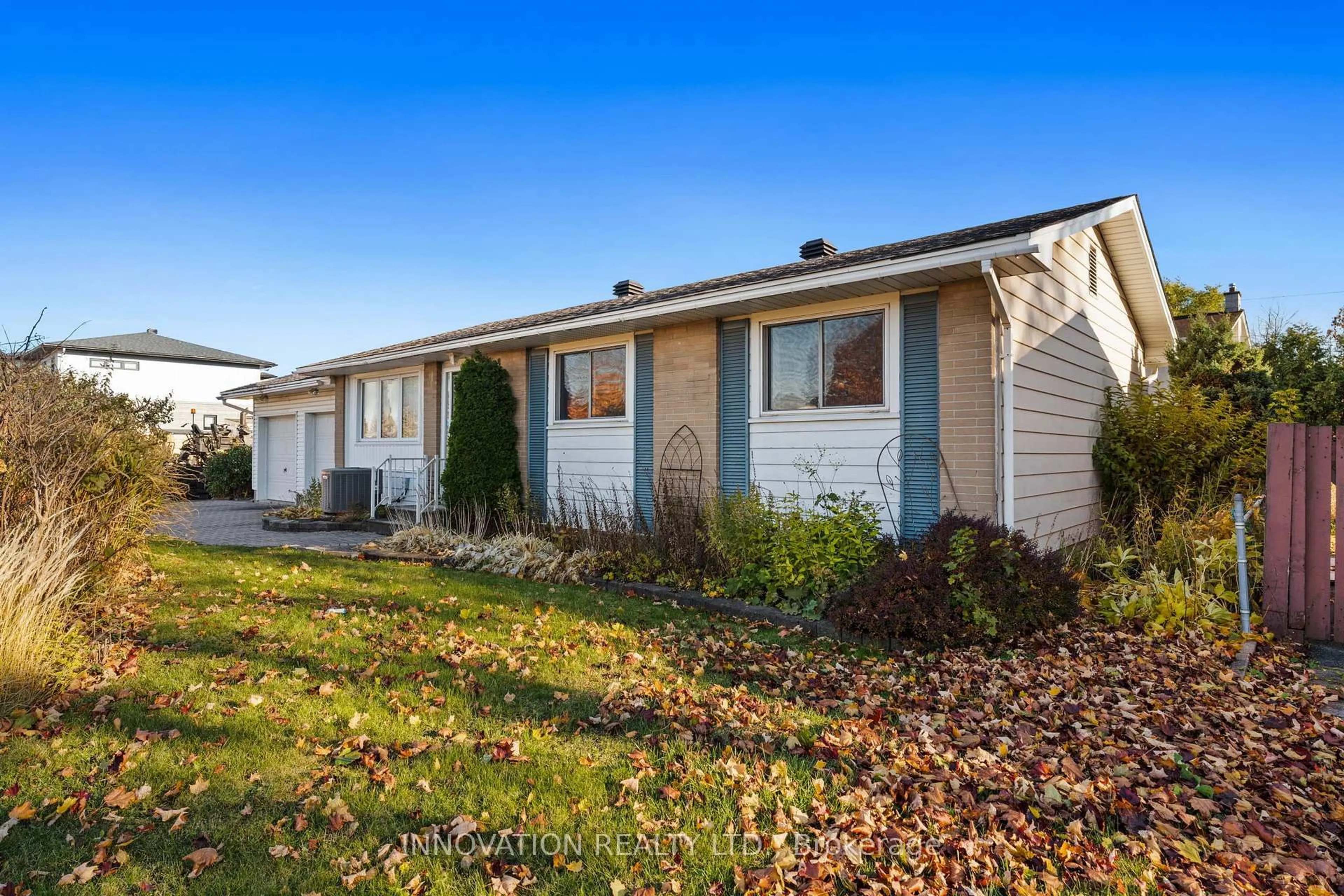 Home with vinyl exterior material, street for 30 Oakview Ave, Ottawa Ontario K2G 3A2