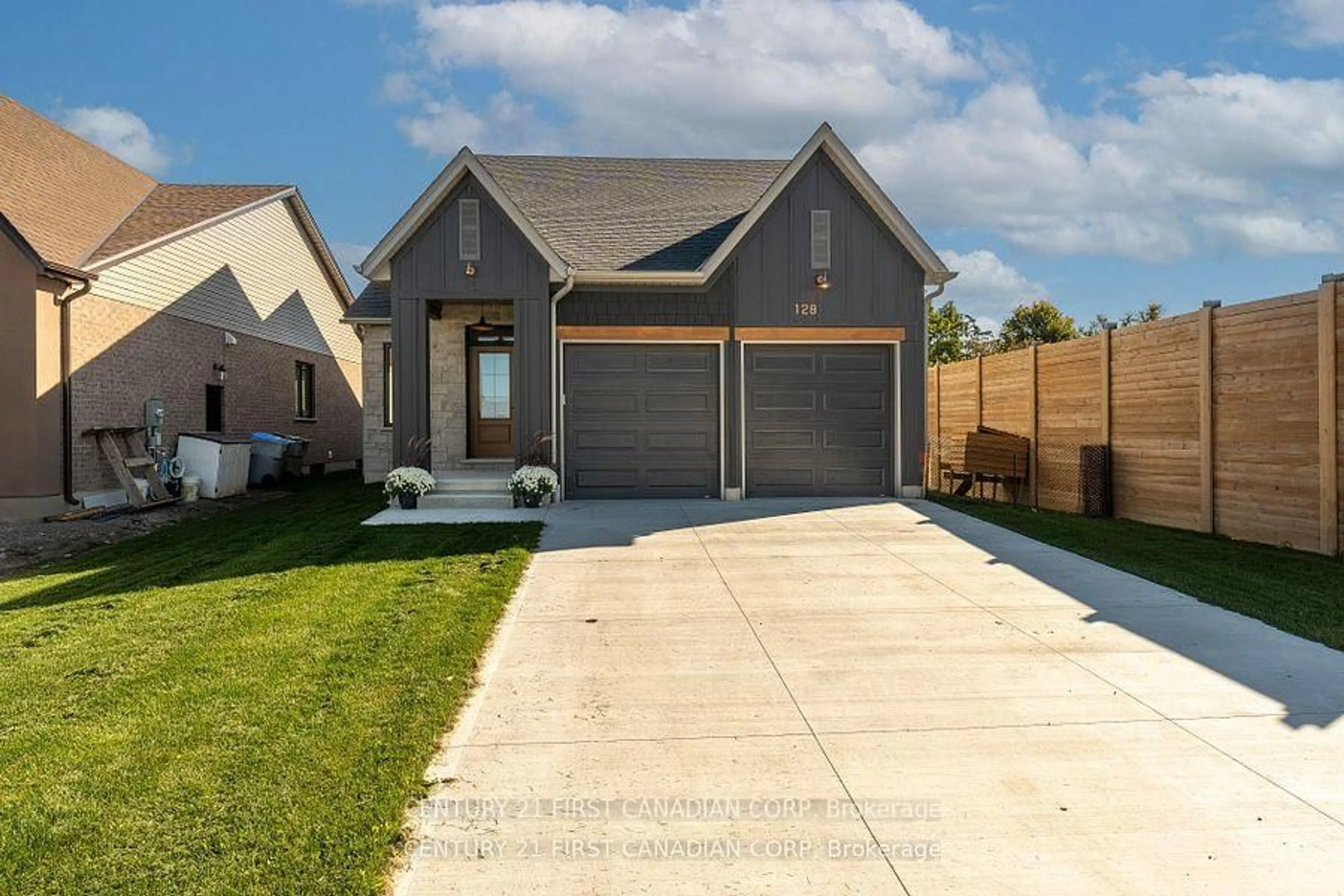 Home with brick exterior material, street for 128 Scotts Dr, Lucan Biddulph Ontario N0M 2J0