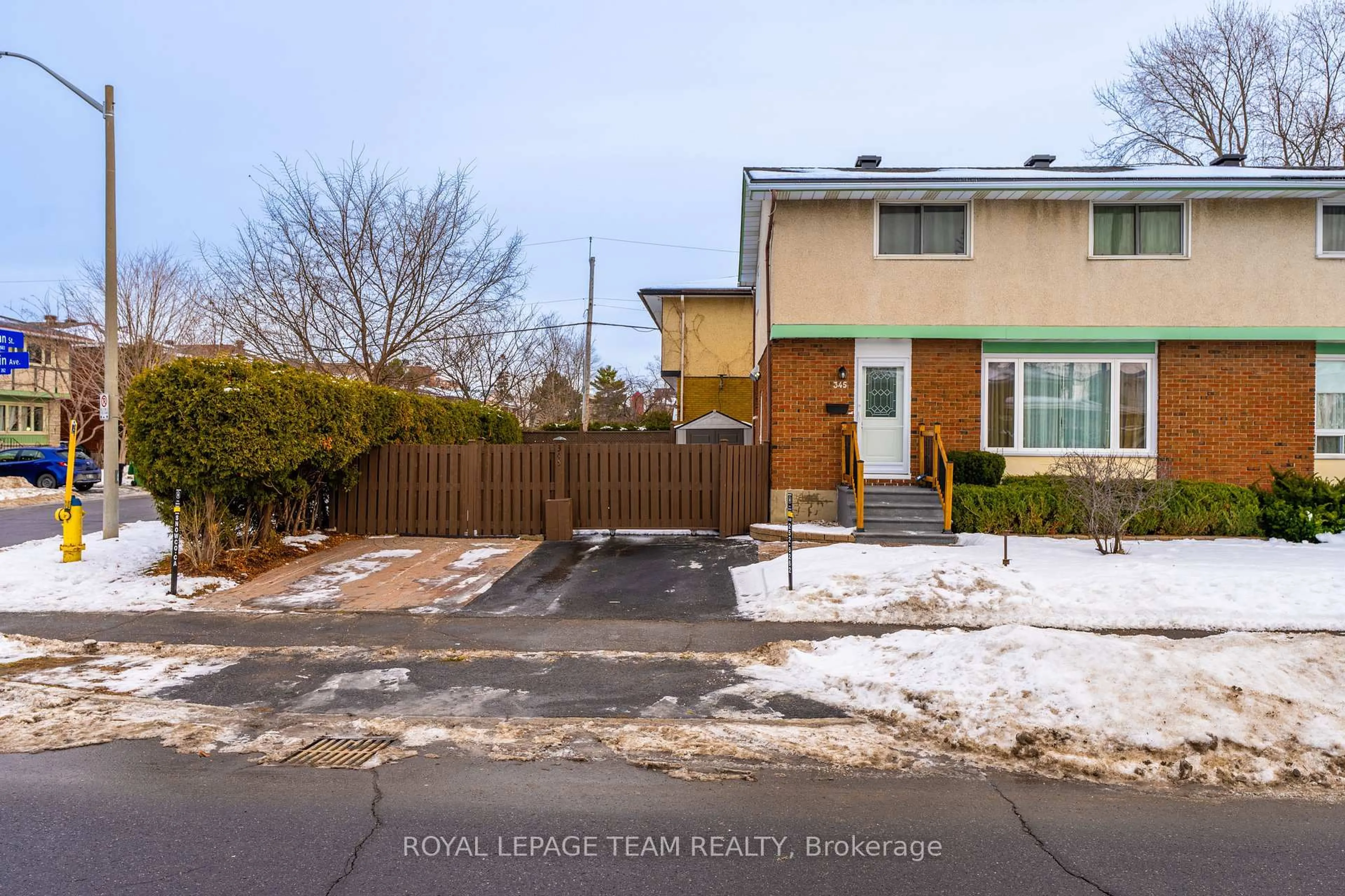 A pic from outside/outdoor area/front of a property/back of a property/a pic from drone, street for 345 Poulin Ave, Ottawa Ontario K2B 5T9