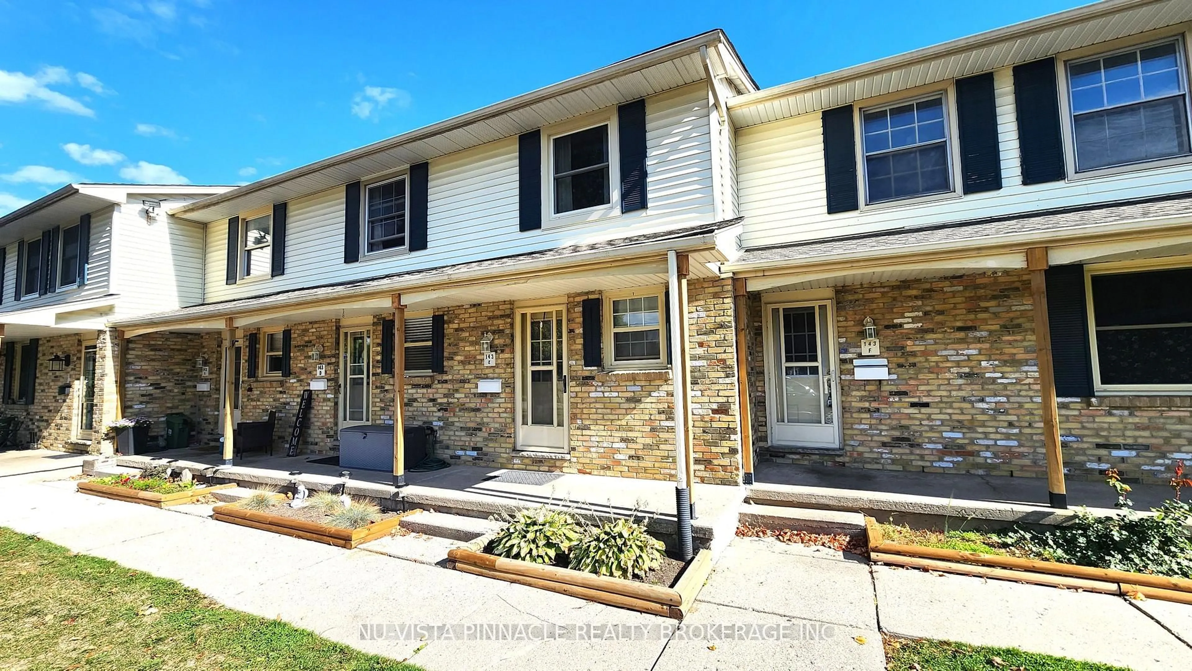 Home with vinyl exterior material, street for 143 Wellesley Cres #E, London East Ontario N5V 1J6