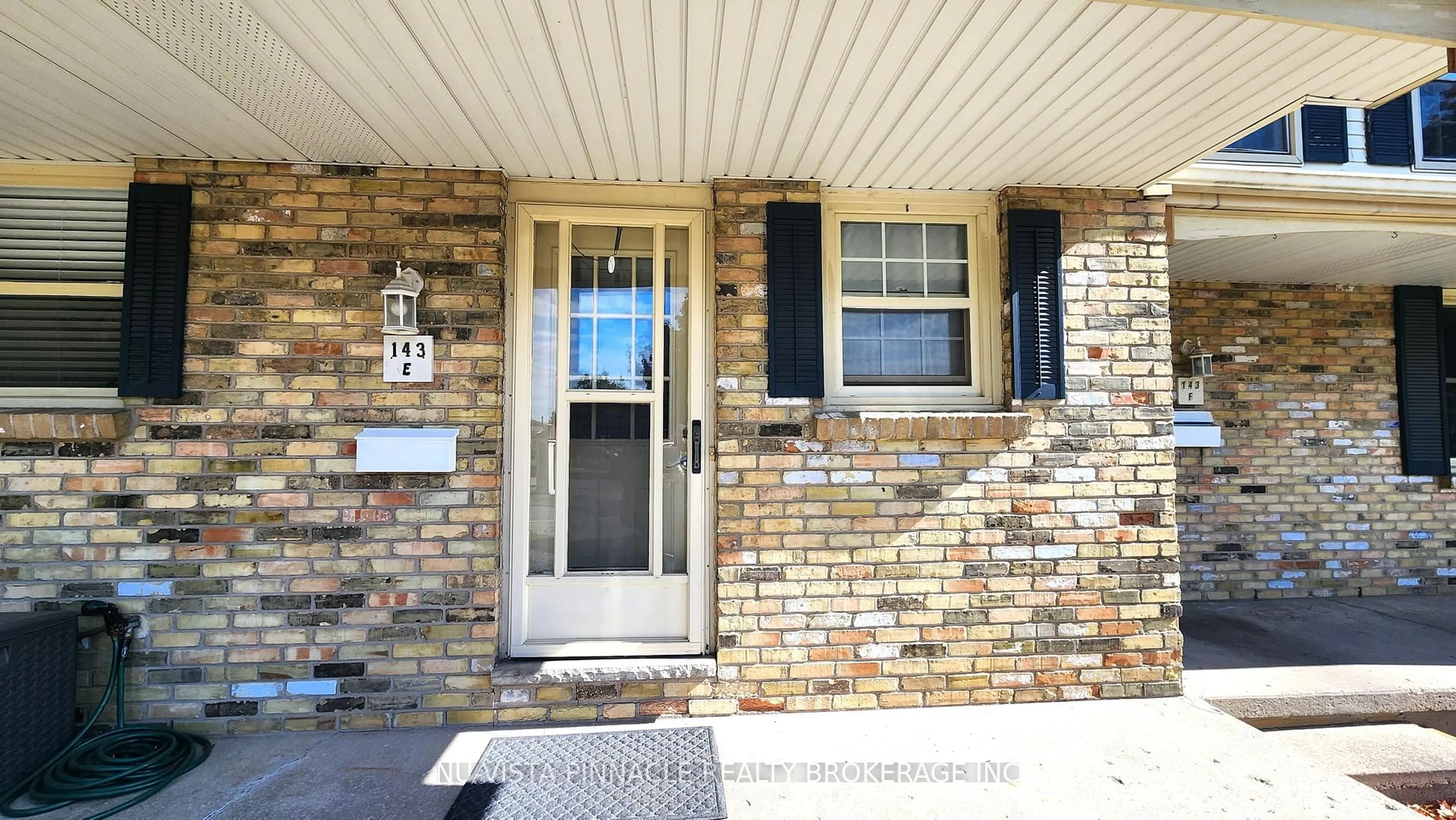 Home with brick exterior material, street for 143 Wellesley Cres #E, London East Ontario N5V 1J6