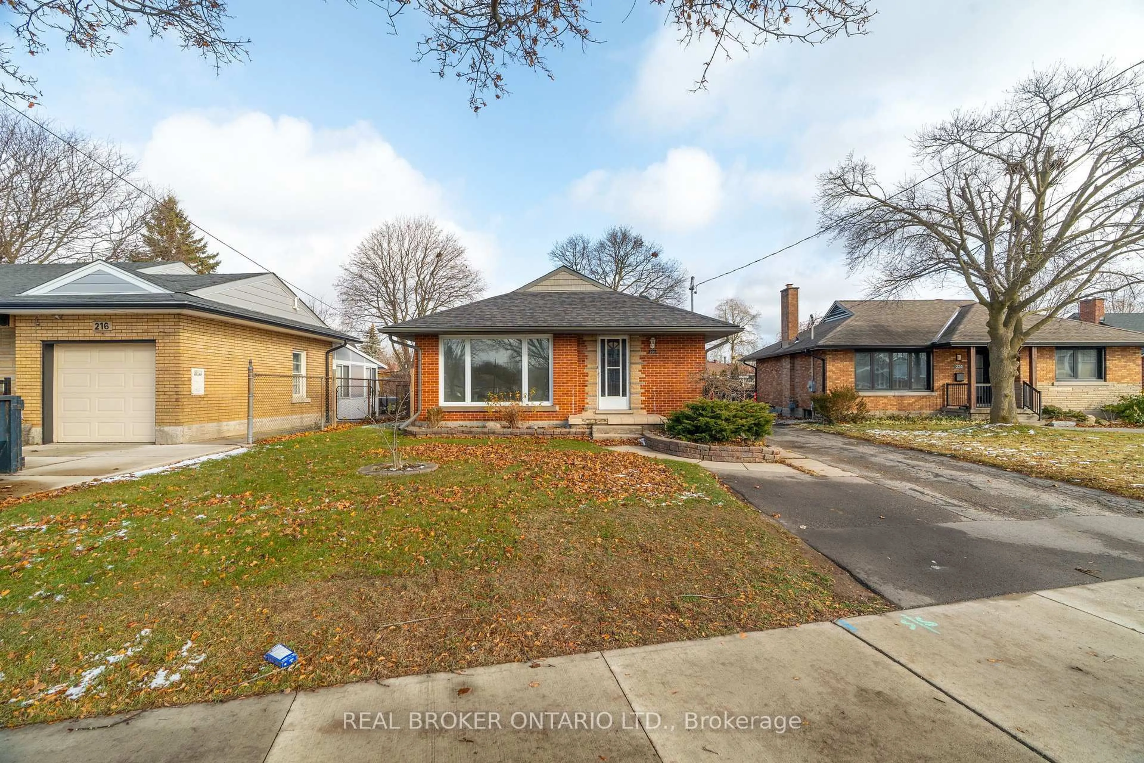 Home with brick exterior material, street for 220 Bruce St, Kitchener Ontario N2B 1Z3