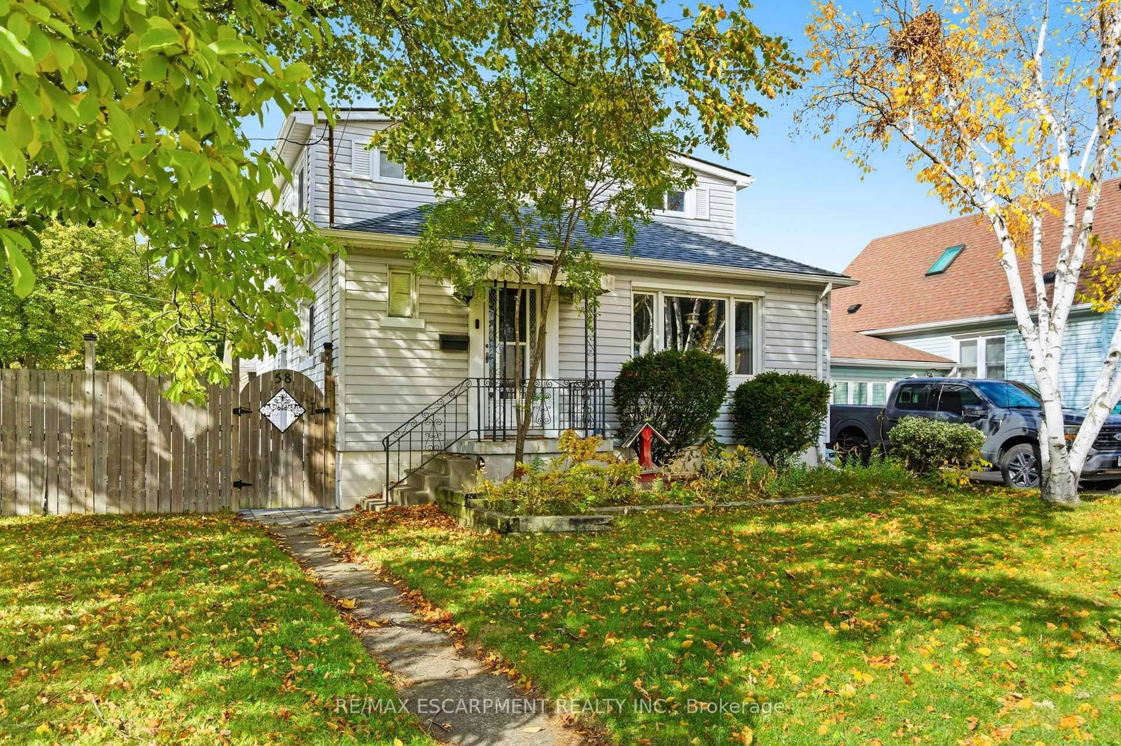 Home with vinyl exterior material, street for 58 Seven Oaks Dr, Hamilton Ontario L9A 4E2