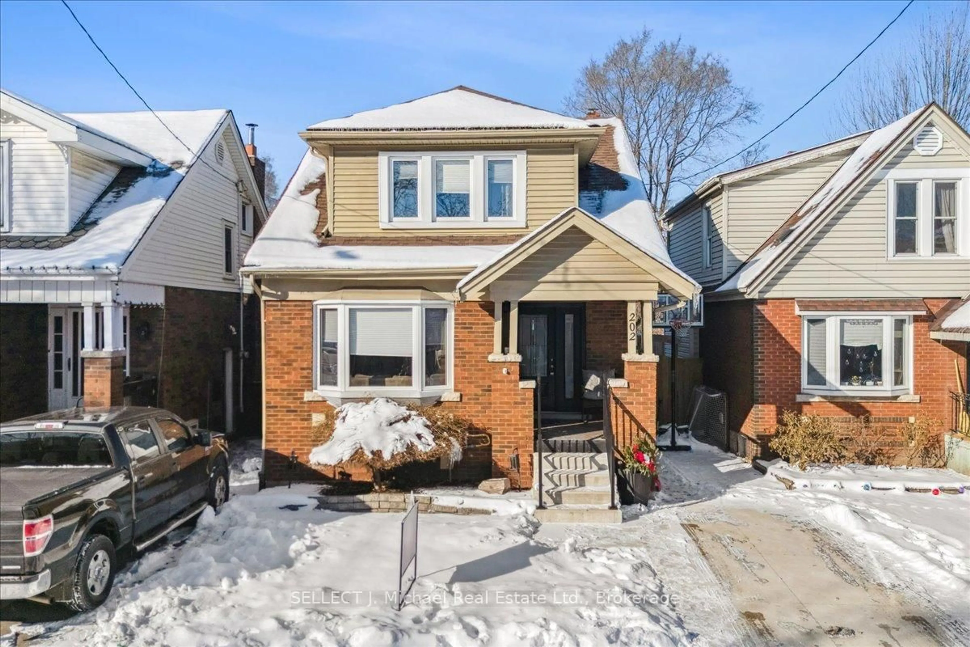 Home with brick exterior material, street for 202 London St, Hamilton Ontario L8K 2G9