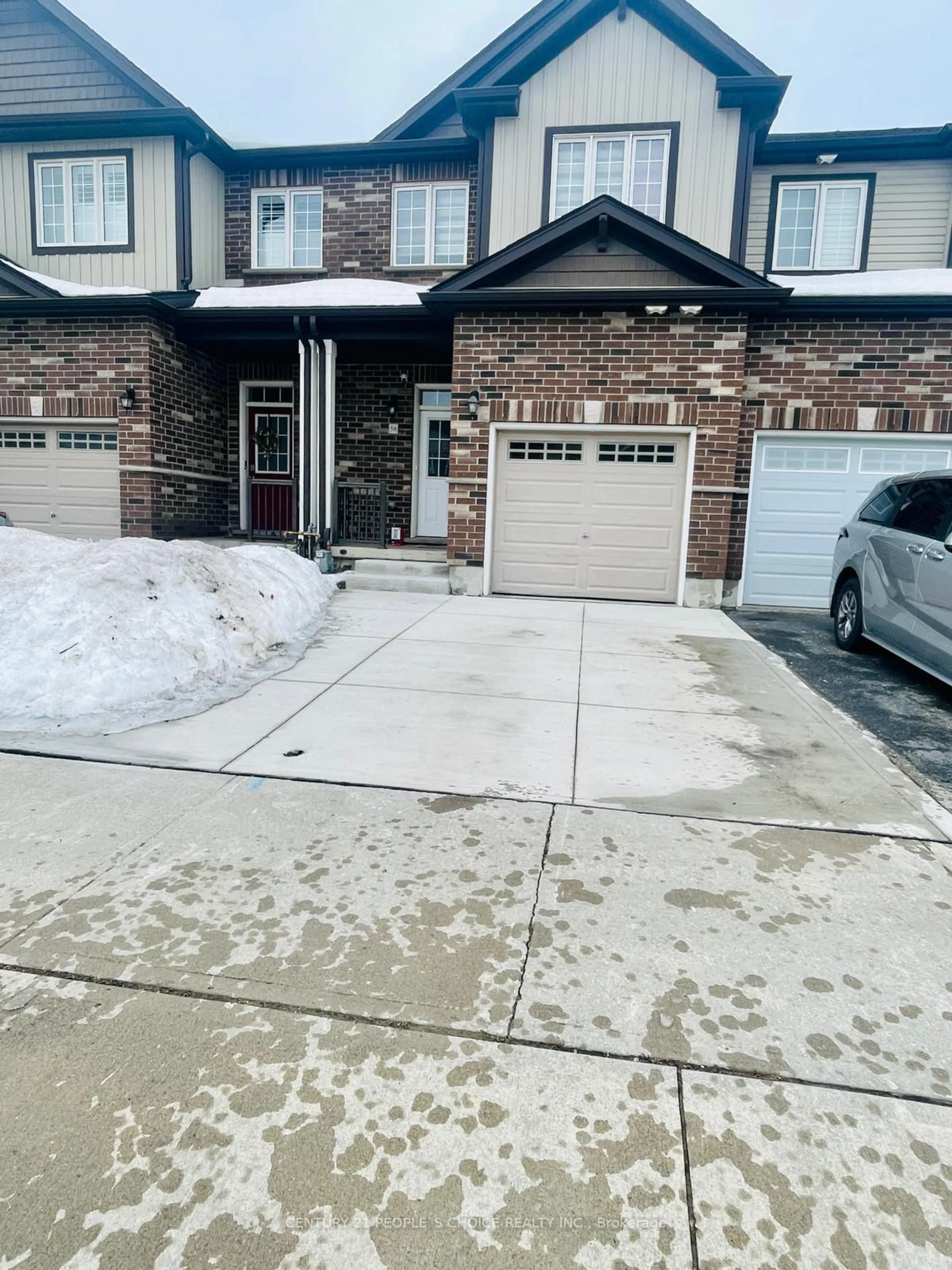 Home with brick exterior material, street for 58 Renfrew St, Kitchener Ontario N2R 0G5