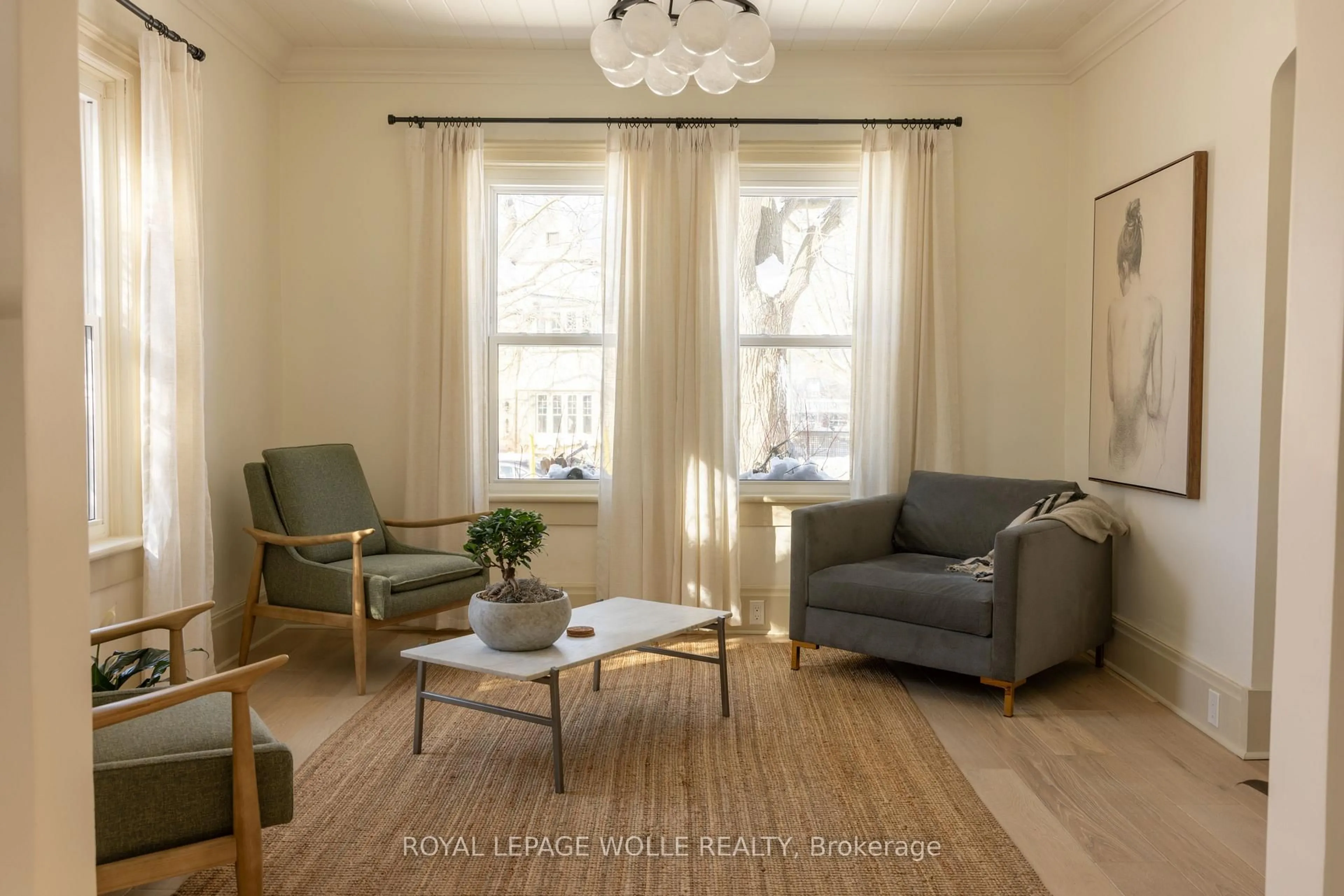 Living room with furniture, wood/laminate floor for 23 Centre St, Woolwich Ontario N3B 2T8