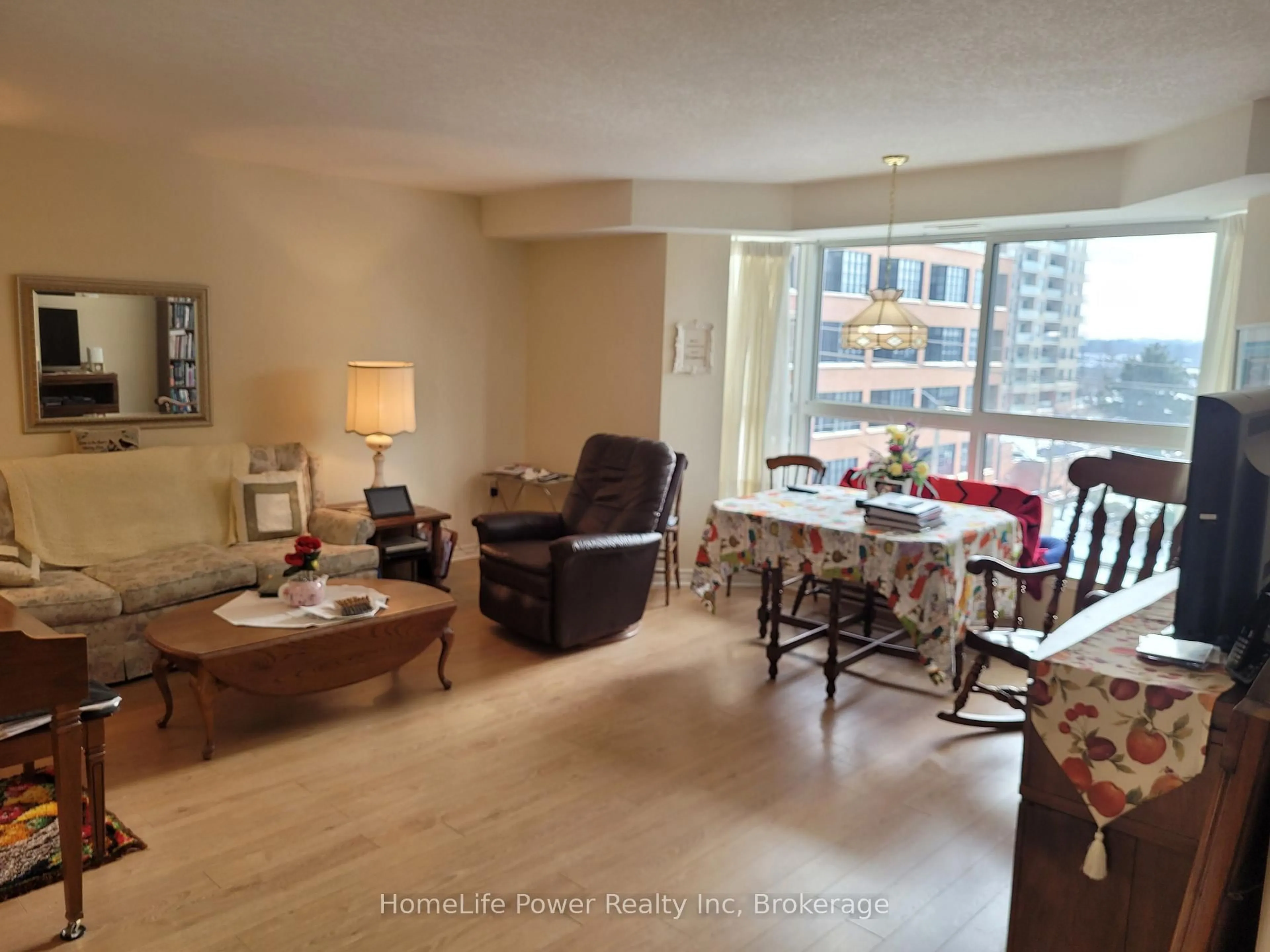 Living room with furniture, unknown for 20 ST GEORGE St #311, Kitchener Ontario N2G 2S7