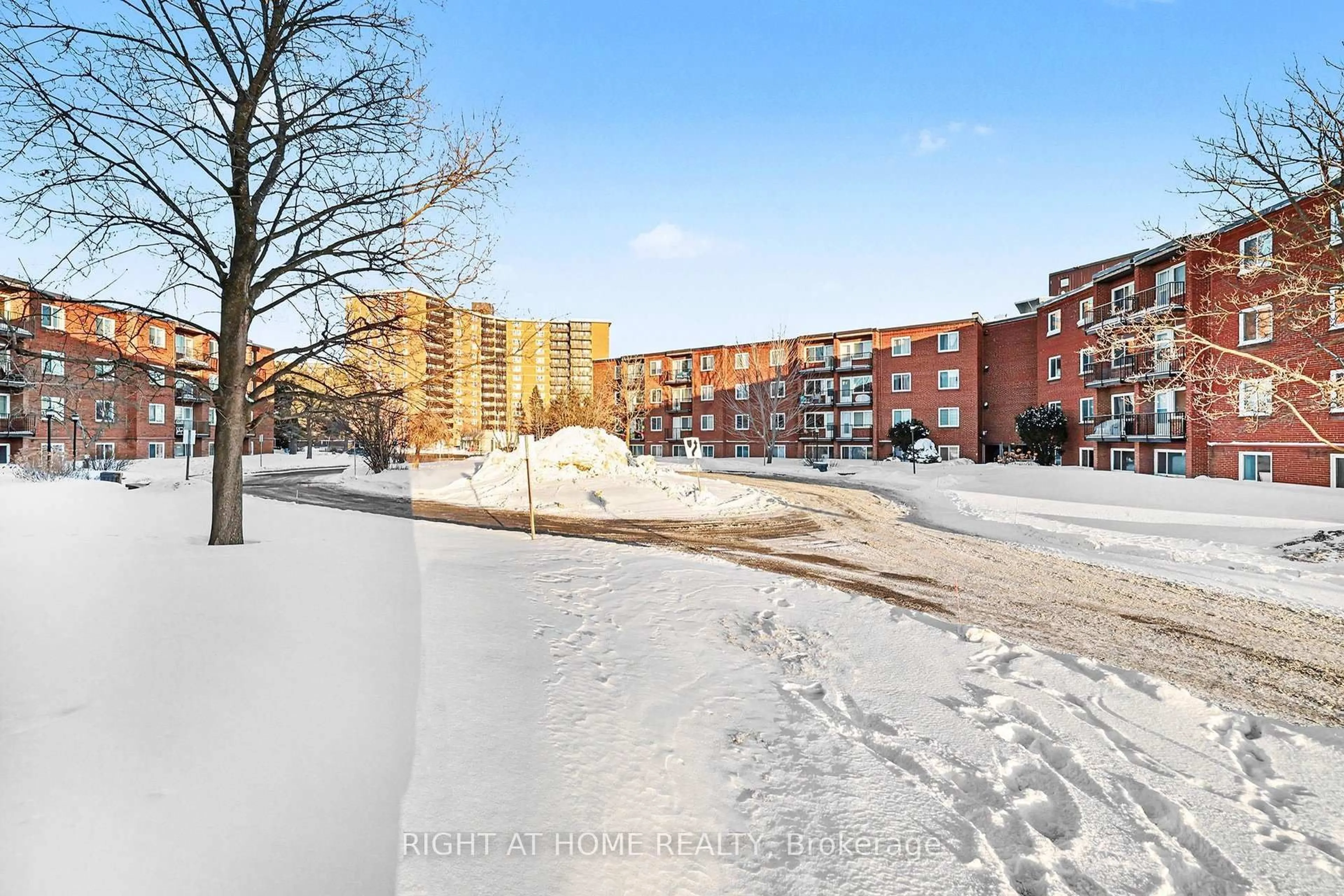 A pic from outside/outdoor area/front of a property/back of a property/a pic from drone, street for 2044 Arrowsmith Dr #305B, Ottawa Ontario K1J 7V8