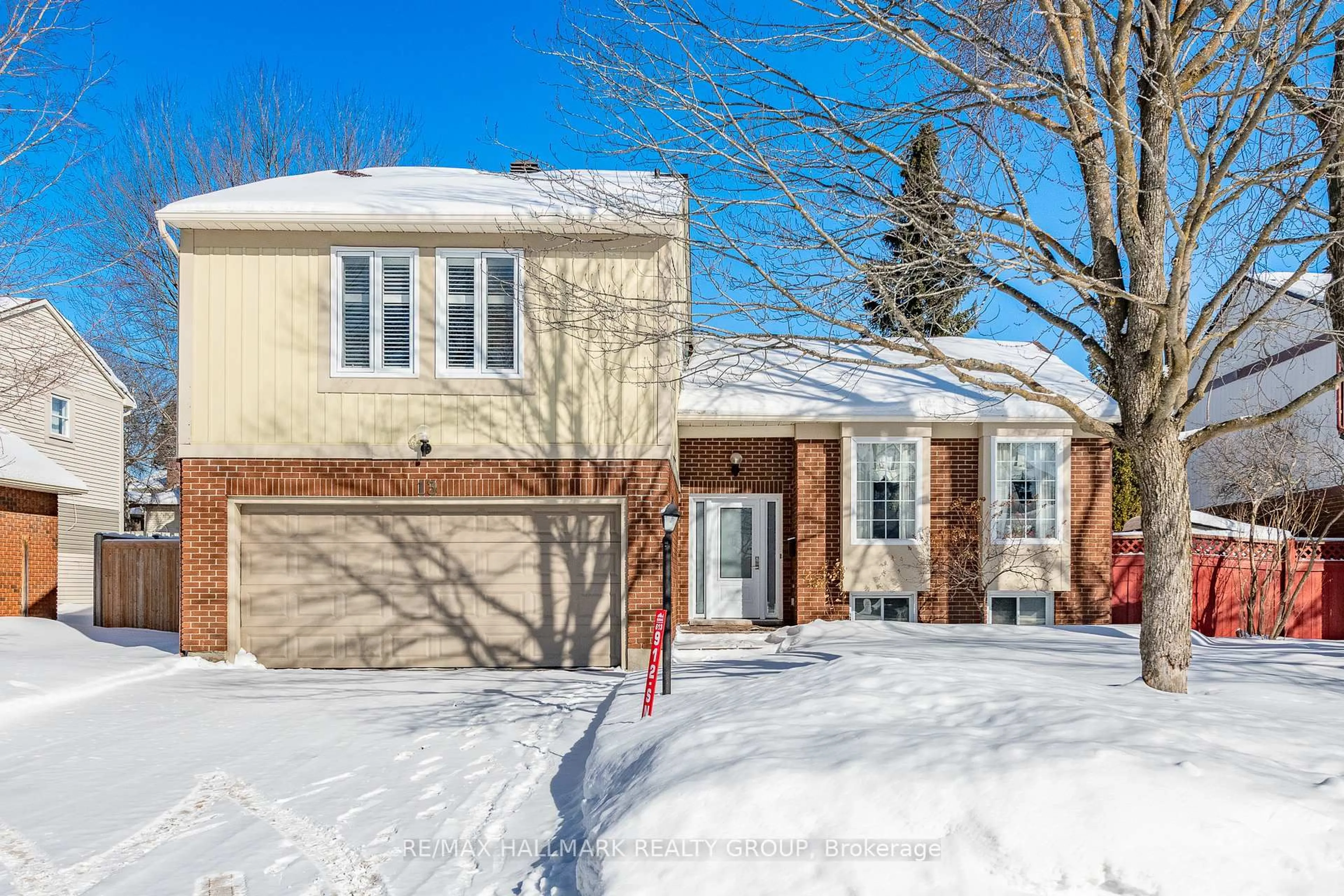Home with brick exterior material, street for 13 Trotting Way, Ottawa Ontario K2M 1B3