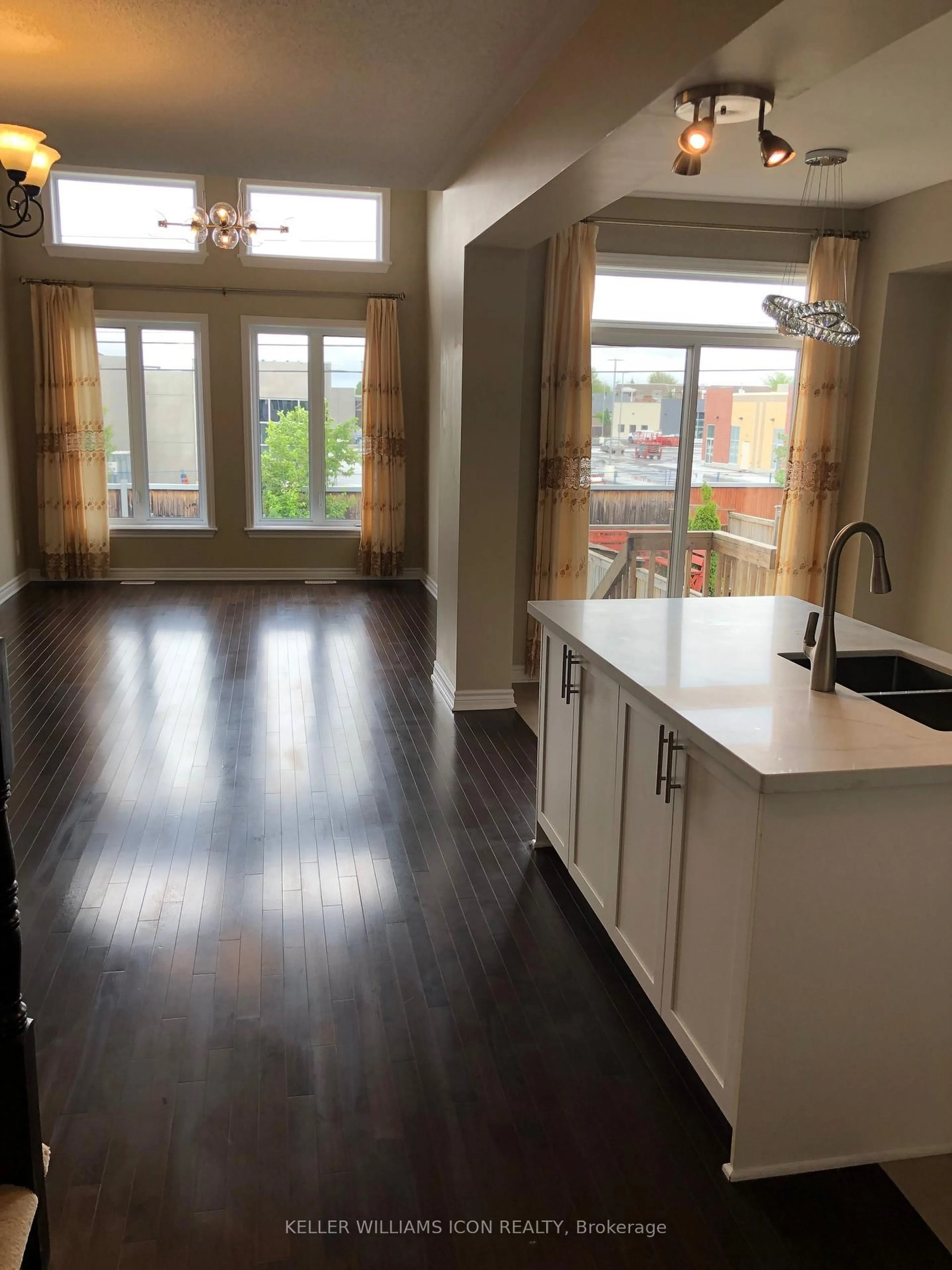 Open concept kitchen, wood/laminate floor for 571 Remnor Ave, Ottawa Ontario K2T 0A5