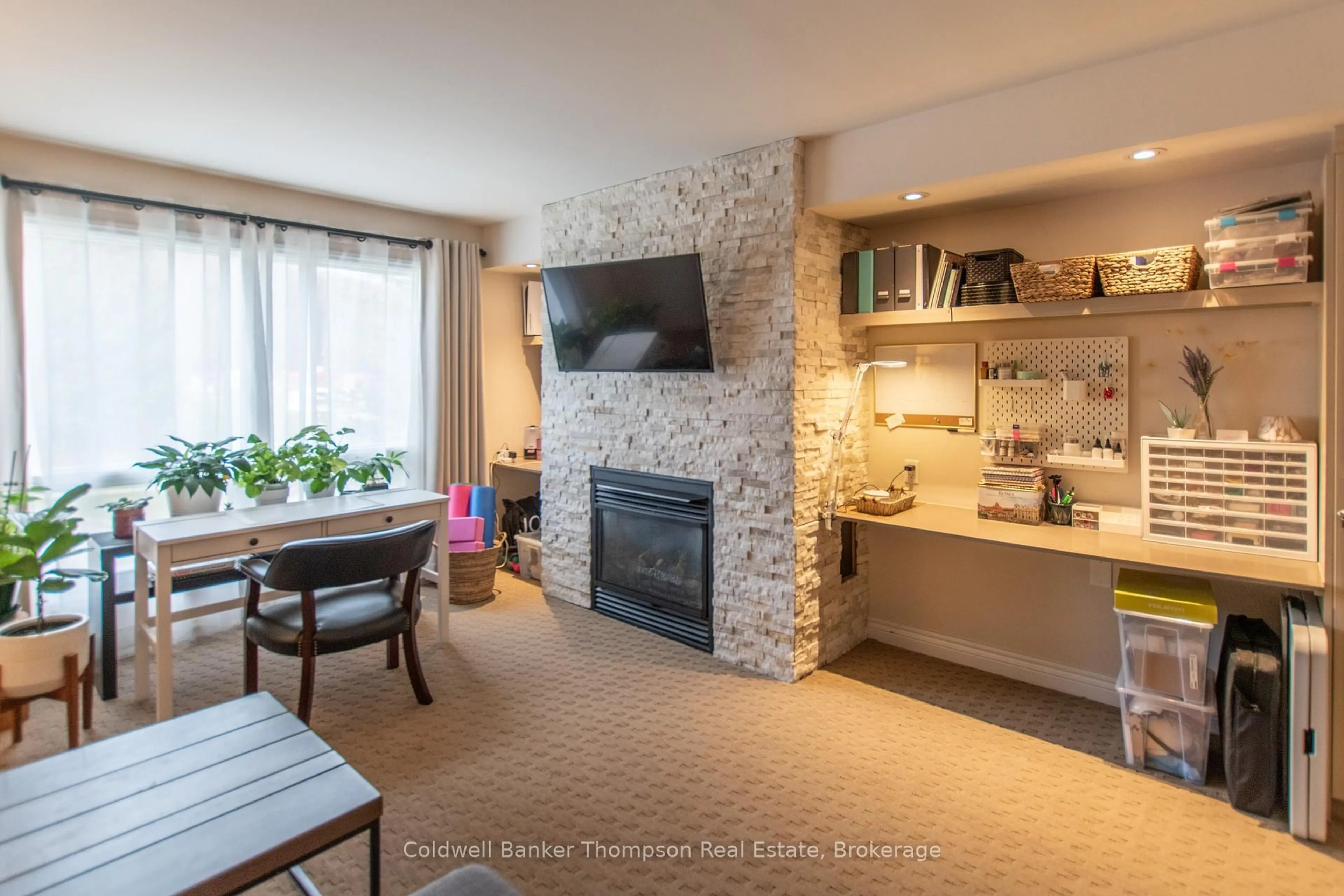 Living room with furniture, ceramic/tile floor for 1235 DEERHURST Dr #53-201, Huntsville Ontario P1H 2E8