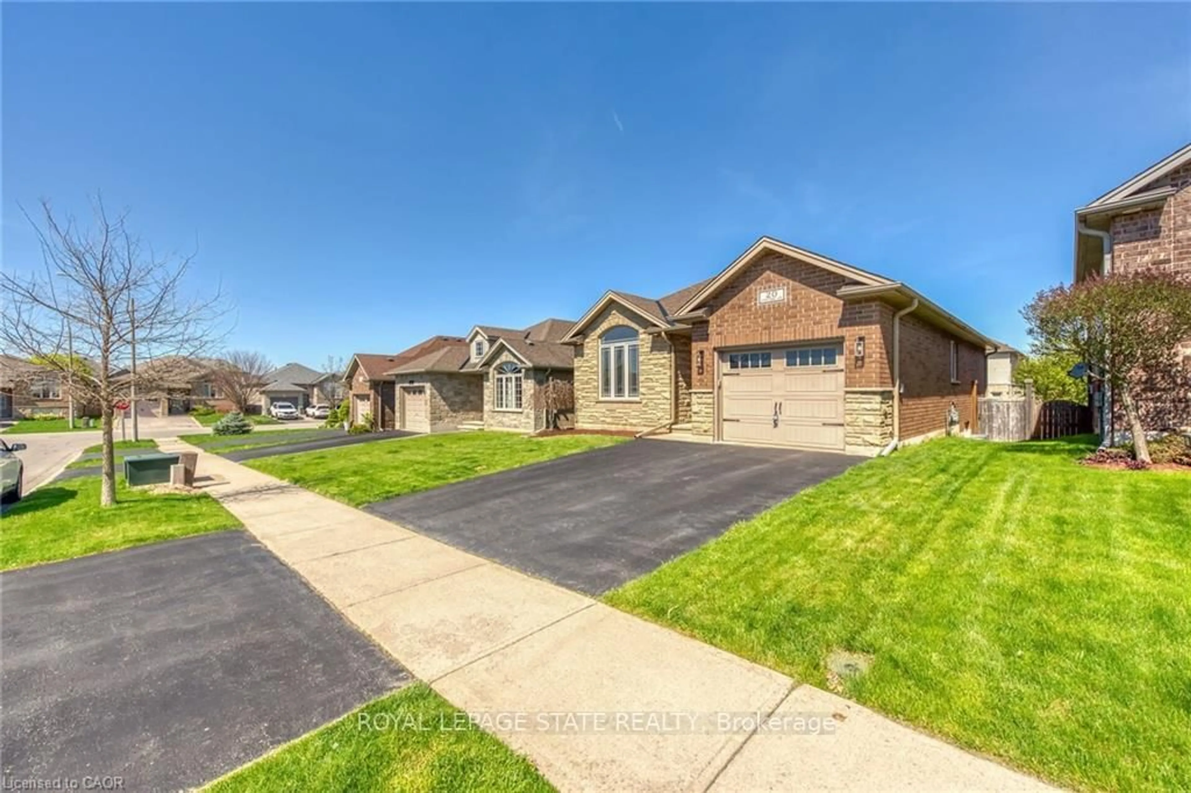 Home with brick exterior material, street for 20 Schertzberg Lane, Brantford Ontario N3T 0B3