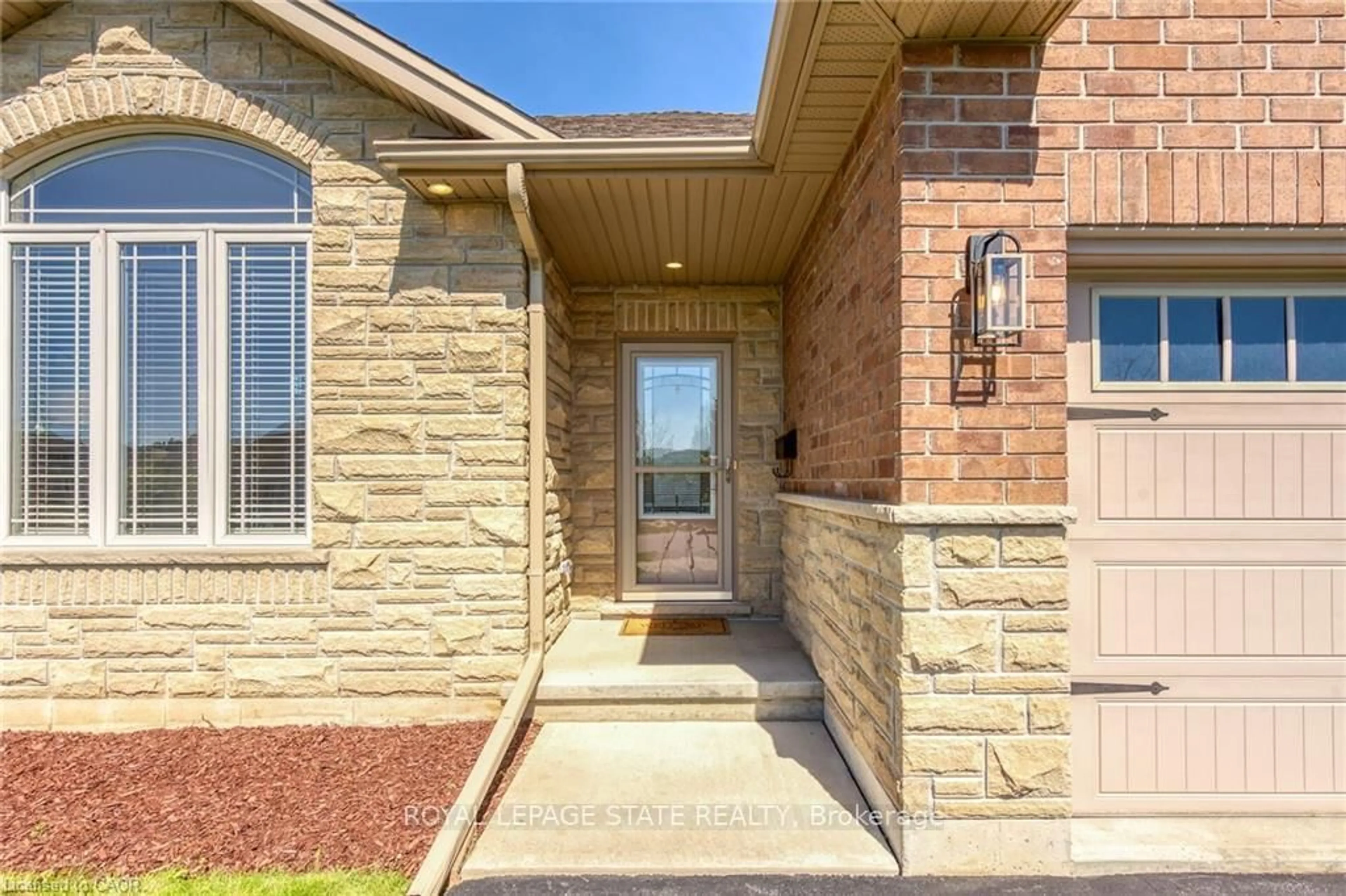 Home with brick exterior material, street for 20 Schertzberg Lane, Brantford Ontario N3T 0B3